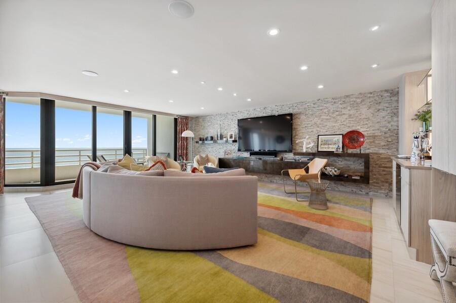 This magnificent 3 bedroom, 3.5 bath residence is the height of oceanfront luxury. Upon entering, you are welcomed by expansive ocean views & stunning design details. The renovated kitchen features sleek white cabinetry w/ hidden appliances, custom lighting & an oversized cook
island with seating. The living room includes a custom stone feature wall with built-in shelving. The large primary suite includes an opulent ensuite bath, walk-in closet with custom built-ins & forever views of the city of Boca Raton. Each of the 2 guest suites feature incredible city views & renovated bathrooms with custom tile work, contemporary cabinetry & fabulous hardware. This spacious oceanfront paradise features porcelain & marble flooring, custom lighting & countless designer details. The Addison On The Ocean is an exclusive oceanfront condominium on the sparkling shore of Boca Raton, Florida. This opulent condominium offers resort-style living for just 169 luxurious residences. Each residence features immense square footage and panoramic vistas of the turquoise Atlantic ocean. The Addison On The Ocean welcomes you with dramatic porte-cochere entries with stunning water features, designer landscaping and premier valet service.

Upon entering the lobby, you are greeted by stunning interior design elements and a backdrop of the glistening ocean. This concierge building features all the lavish amenities one would expect in a 5-star resort. Few condominiums offer dining, The Addison On The Ocean offers dining in the completely renovated restaurant as well as, Al Fresco options on the pool deck, gazebo or while lounging on the ocean. Residents may also gather and entertain in the fully renovated social room. The impeccable food service includes breakfast, lunch, take-out dinners and private event catering.

The Addison On The Ocean embodies the essence of first class living, including on-site management, 24-hour maintenance and in-house concierge. The stress-free lifestyle is enriched by conveniences that may be arranged by the concierge; including housekeeping, automobile care and transportation services.

The 24-hour security team utilizes state of the art communication, while the grounds are monitored with vast video surveillance coverage. BuildingLink technology enables residents, management and staff to interact in real time. The innovations continue with newly installed electric vehicle charging stations.

Health and self-care are of the utmost importance and The Addison On The Ocean embraces a healthy lifestyle with fully renovated wellness areas, including five fitness centers, saunas, steam rooms and massage services. There are an array of recreational facilities including a dog park, aquatic therapy, water aerobics, basketball, volleyball, kayaks, bicycles, paddle boards, ping-pong, billiards, arcade games, a library/business center and a gorgeous social hall. This one-of-a-kind property continues to impress with its luxurious outdoor spaces. These spaces include two completely renovated pools, all new decking, a fabulous al fresco liquor lounge, custom fire-pits and waterfall features.

The Addison On The Ocean is appointed with only the finest trimmings and ultra-luxury amenities, it is Boca Raton's most exclusive oceanfront address.