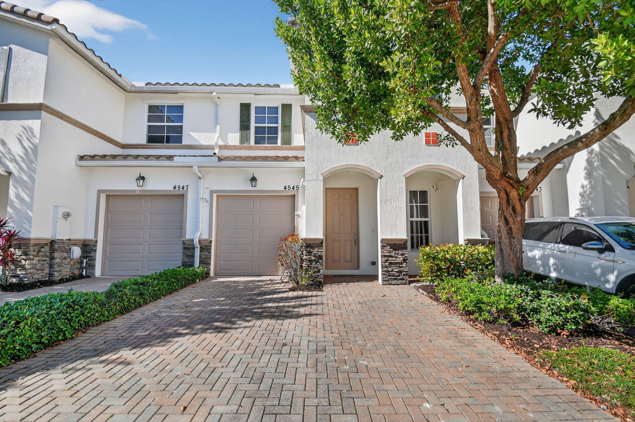Lakefront townhouse built in 2017 located in a gated West Palm Beach community just minutes from downtown, major highways, and local dining. This well-appointed home features an updated kitchen and bathrooms, three bedrooms, two and a half baths, and full impact windows throughout. Additional highlights include a one-car garage, modern lighting, and a spacious primary suite with en-suite bath and walk-in closet. Enjoy tranquil water views along with community amenities including a resort-style pool, fitness center, and basic cable. A great opportunity for comfortable, low-maintenance waterfront living. Schedule your private showing today.
