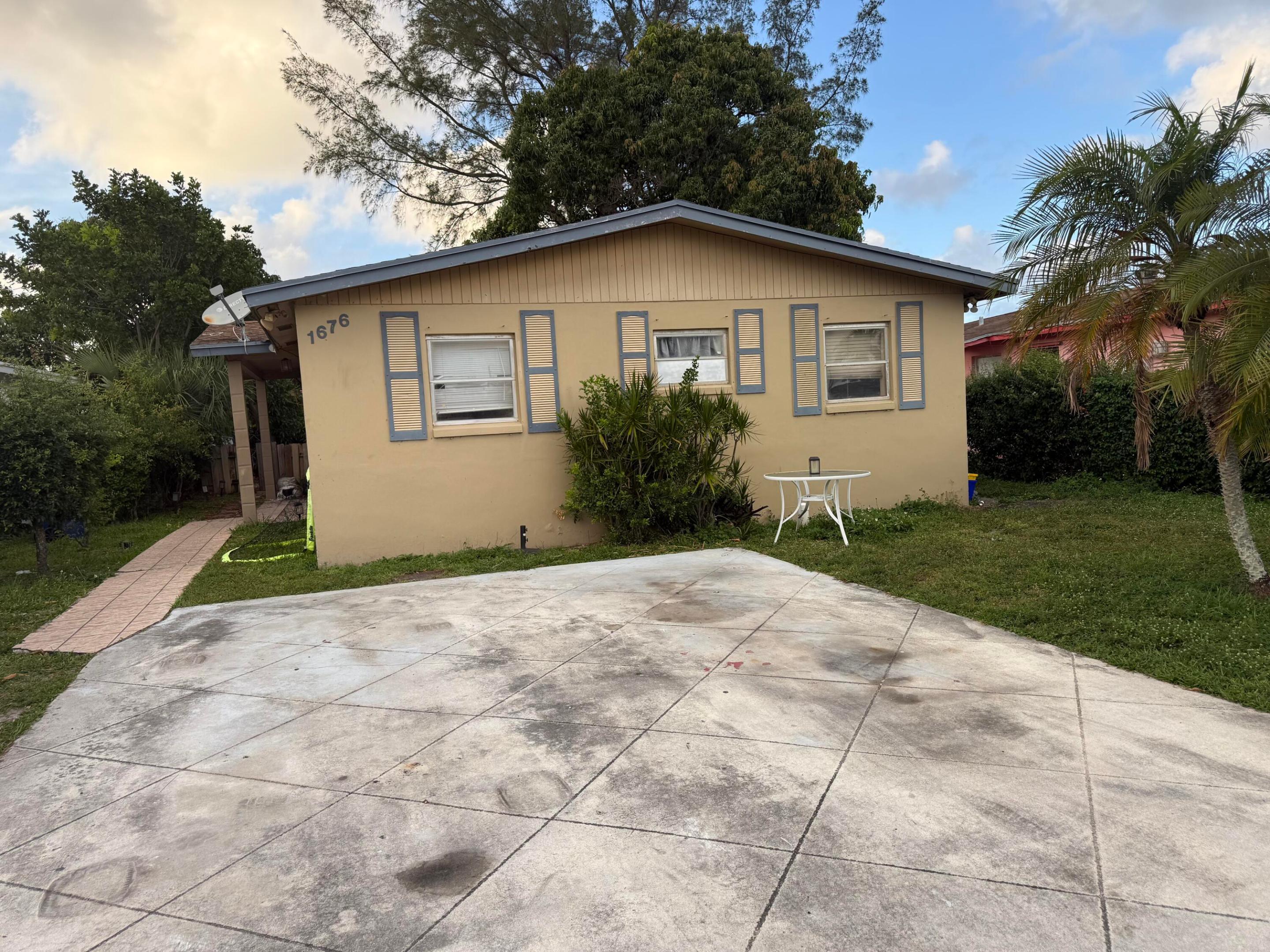 Well-Maintained Single-Family Home in Riviera Beach! Located in a highly desirable area of Riviera Beach, this charming home offers comfort, convenience, and excellent value.The property features tile flooring throughout, a brand-new central A/C system (2025), and an updated plumbing system (2023). Additional highlights include a dedicated laundry room and a spacious, fully fenced yard—perfect for outdoor living, entertaining, or pets.  Ideally situated just minutes from shopping, dining, and the beach, this home provides both lifestyle and location.  Last rented in April 2026 for $2,600/month. Great investment opportunity—investors welcome!