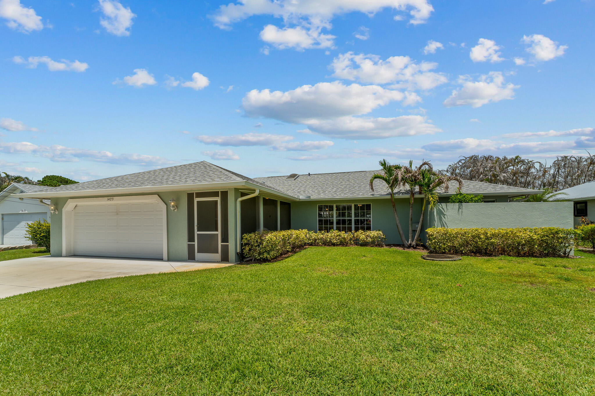 This move-in ready CBS ranch home is located in the highly desirable Sandpiper area. The home boasts an open, split floorplan, vaulted ceilings, gorgeous tile throughout. The large master suite contains a spacious walk-in closet and dual sink bathroom, soaking tub and separate shower. The updated kitchen has a large eat-in area and granite countertops and an exit to the screened-in tile patio. Generously sized guest rooms and two bonus seasonal rooms ideal for home office, hobby or craft rooms. Laundry room is located inside the home, large backyard is completely fenced-in. New roof in 2023 and new AC in 2021.