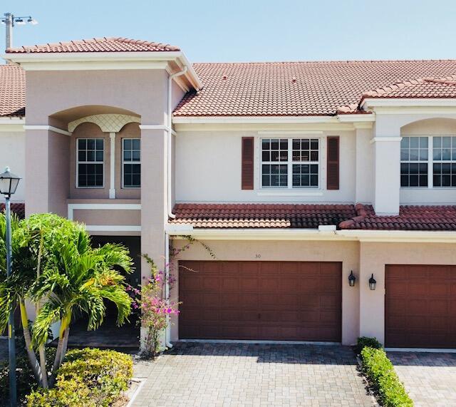 Discover this Boynton Beach gem! Spacious 3BR/2.5BA townhome with a 2-car garage and versatile loft—perfect for a home office or extra living space. Features include 10' ceilings, polished concrete floors, and a bright eat-in kitchen. The primary suite offers a jacuzzi tub and oversized walk-in closet. Enjoy a private covered patio with no rear neighbors. Community amenities include a pool, playground, and access to Caloosa Park. Conveniently located near Atlantic Ave, I-95, and Boynton Beach Mall.