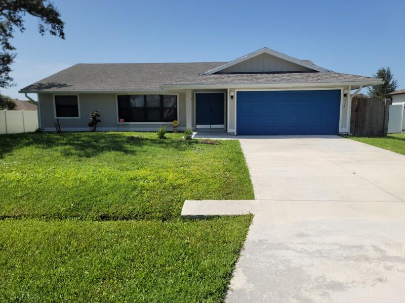 Welcome to this charming single-story residence in PORT ST LUCIE, offering 1,662 square feet of well-designed living space. This three-bedroom, two-bathroom home provides comfortable accommodations with practical functionality throughout. The floor plan spans one level, making it easy to navigate and maintain. A two-car garage offers convenient parking and storage solutions. Located in Port St. Lucie, this property presents a solid opportunity for those seeking straightforward, dependable residential living. This home features impact windows, accordion shutters for the sliders and front door area. New Gutters, New Washer, Refrigerator, Dishwasher, Hurricane impact skylight as well as a surge protector on the meter. Close to shopping and has easy access to Fl turnpike and 95hwy.