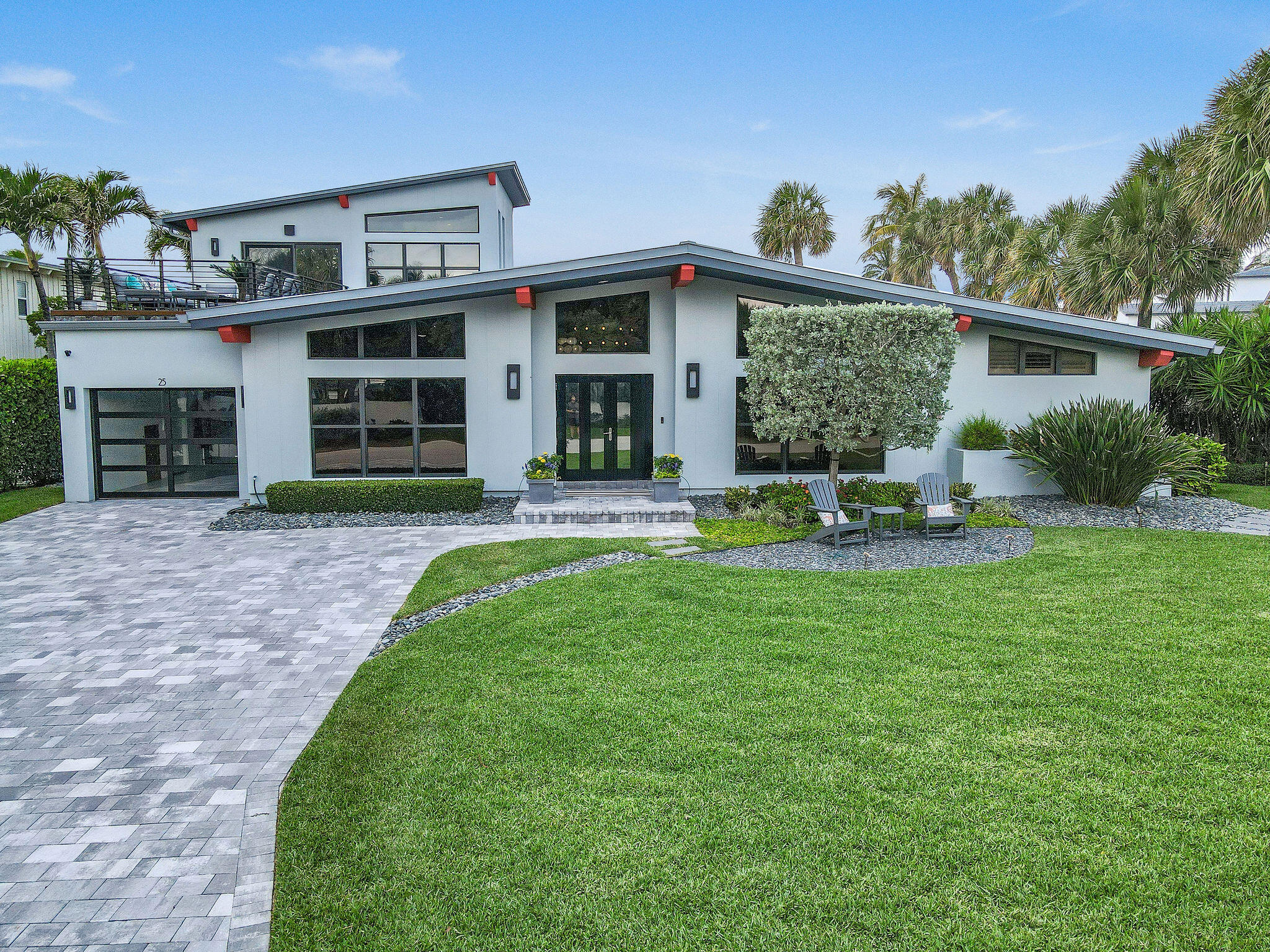 Located  in highly desirable  Jupiter Inlet Colony, A unique gem located on a corner lot of the southern tip of Jupiter Island.Only interior lot with unmatched views of the Turquoise water of  the Atlantic Ocean and Inlet water way. A very short distance to the path to the beach. Furnished 3BR/3BA  pool home .Meticulously maintained with many custom upgrades throughout the home. Features Volume ceilings, custom lighting, impact windows and doors. Cook with  Thermador kitchen appliances.Remolded Primary Suite Large Bedroom, Lavish Primary Bathroom Separate shower and Free Standing tub. Lounge by the pool or perfect your golf skills with 3 hole putting green.Enjoy ocean breezes a sunrise cup of coffee and a sunset glass of wine.