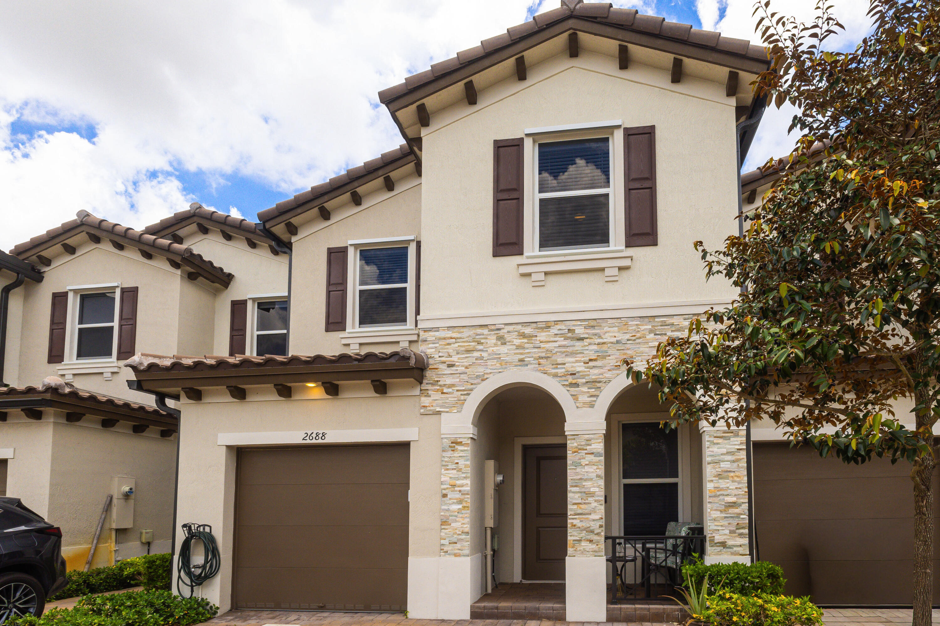 Welcome to 2688 NW 55th Ter in Lauderhill — a beautifully maintained home that blends comfort, style, and outdoor living. Inside, you'll find a bright and inviting layout with spacious living areas, abundant natural light, and a functional kitchen designed for both everyday living and entertaining. Step outside to a newly upgraded backyard oasis featuring fresh turf, elegant lighting, and a stylish tiled patio area, creating the perfect space for grilling, relaxing, and hosting friends year-round. Conveniently located near the Florida Turnpike, this home offers easy access to shopping, dining, schools, parks, and major commuter routes while still being tucked away in a quiet residential neighborhood. A move-in ready property with great indoor and outdoor appeal.