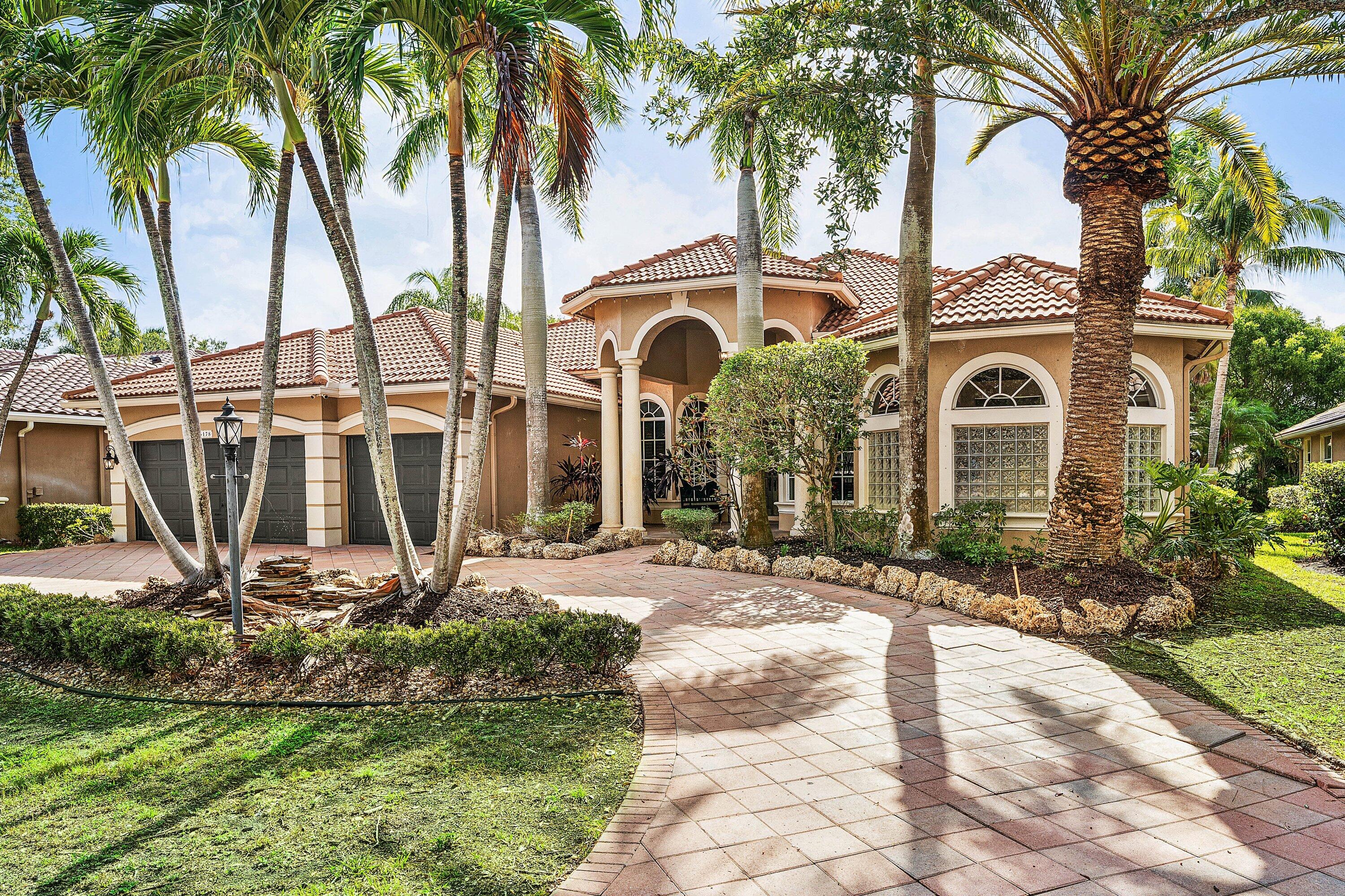 Welcome to this spacious and well-located residence in the highly sought-after Long Cove section of Heron Bay. Offering over 3,100 square feet of living space, this 4-bedroom, 3-bath home features soaring volume ceilings, an open and functional floor plan, smart home technology, and a sauna.The private backyard is designed for entertaining with an inviting pool with waterfall, ample patio space, and privacy wall. Located within one of Coral Springs' most desirable gated communities and zoned for top-rated A-rated schools, residents enjoy access to resort-style amenities, TWO clubhouses, parks, walking trails, and convenient access to shopping, dining, and major highways. A rare opportunity to own in one of South Florida's premier family-friendly communities with low HOA fees! Per the tax records, the property is a 5-bedroom home. The current owners have customized the floor plan to suit their lifestyle. One bedroom has been converted into a professional office featuring built-in custom desk and shelving. Another bedroom has been opened to the main living area and is currently used as a children's playroom. Both spaces offer flexibility and may be utilized as bedrooms, office space, playroom, den, or converted back to their original bedroom configuration by the new owner. Information is deemed reliable but not guaranteed. Buyer and buyer's agent are responsible for independently verifying all measurements, square footage, lot size, HOA information, school boundaries, room counts, permits, and any other information deemed important to the buyer.