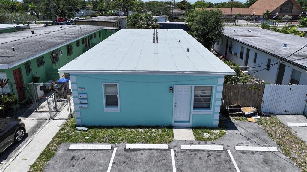 This triplex is a great investment property!  Super easy to maintain. Three one bedroom one bath, each with an additional den that allow the units to be rented for higher than Market value for one bedrooms one bath. Lots of room for improvements on the rents with low expenses to the landlord! Great location close to the hospital and city transportation. This is an expansion community with new developments pushing rents up! Each unit has identical layouts. This is perfect for first time home buyers that want to live in one unit and rent the rest.