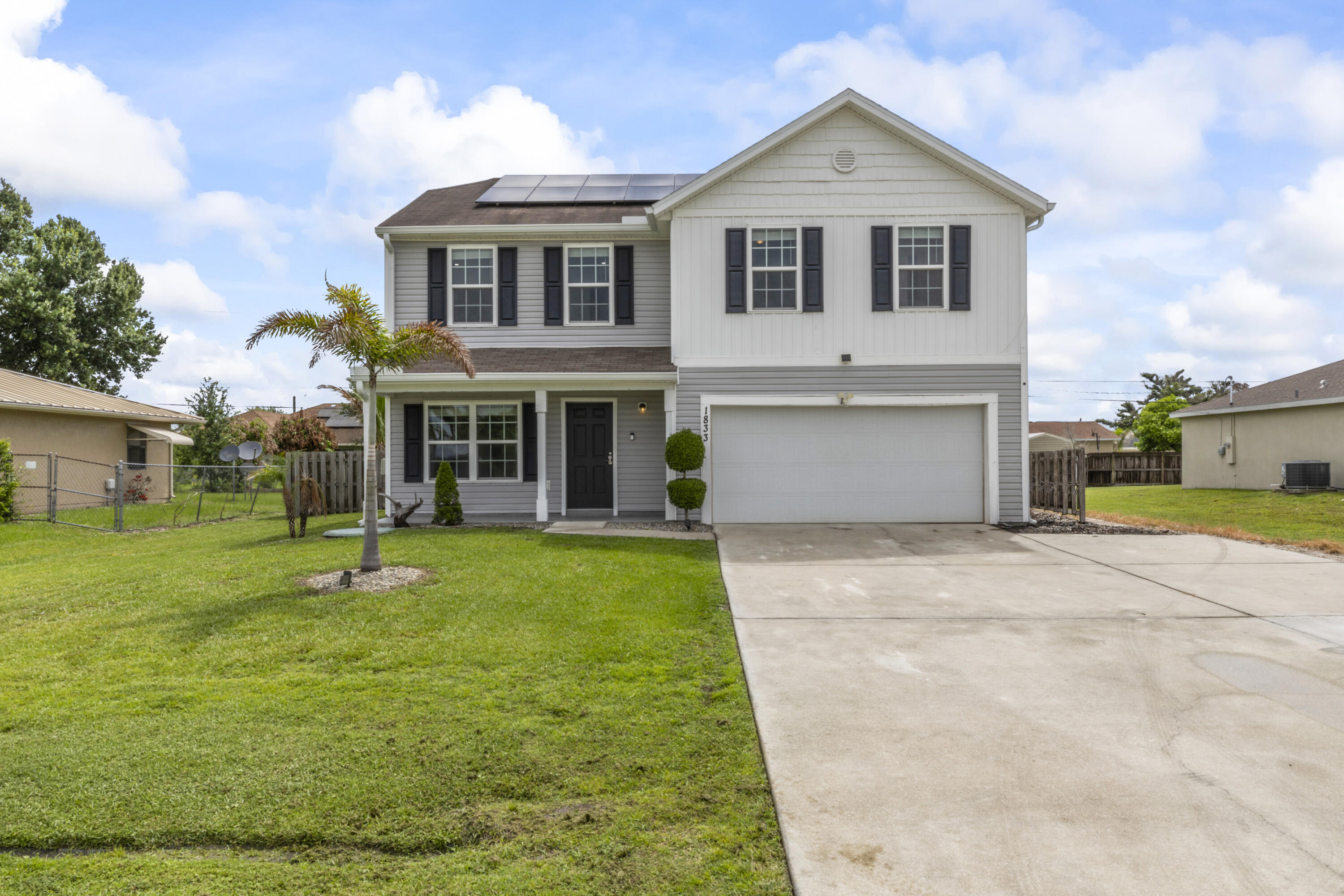 Welcome to this immaculate, move-in-ready home located in the heart of Port Saint Lucie. This 4-bedroom, 2.5-bathroom residence offers an exceptional living experience. The home features energy-efficient solar panels and a fully fenced backyard for added privacy. The expansive outdoor space includes an above-ground pool, perfect for Florida summers, and a convenient storage shed for additional organization. Located in a prime residential zone with effortless access to I-95 and the Florida Turnpike, this property combines practicality with leisure. The home is vacant and easy to show—schedule your private tour today! Property is vacant and on Supra lockbox for easy showings. This home is packed with value, featuring solar panels (2021), a 2025 above-ground pool, a wooden privacy fence (2021), and a 2026 storage shed. Sellers are motivated and welcome offers from qualified buyers. Please include pre-approval or proof of funds with all offers. Use FAR/BAR contract. Buyer to verify all room dimensions and HOA details if applicable.