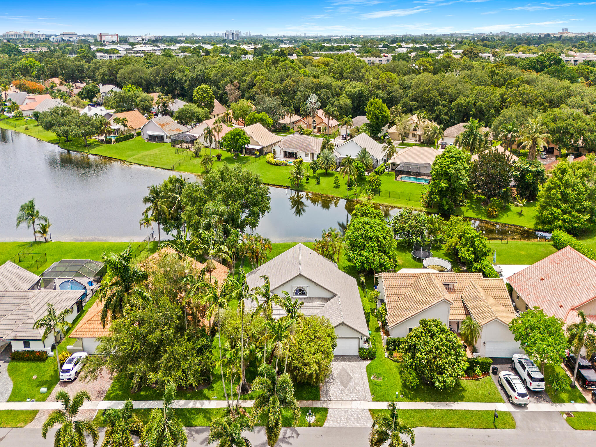 Welcome to this stunning waterfront residence located in Pine Lake Ridge Replat, Davie, offering the perfect blend of comfort and scenic living. This single-story home features three generous bedrooms and three full bathrooms within 2,002 square feet of thoughtfully designed space. The two-car garage provides convenient parking and storage for your vehicles. As a waterfront property, this residence offers direct water access and the serene ambiance that comes with lakeside living. Whether you're seeking a peaceful retreat or a vibrant waterfront lifestyle, this three-bedroom home in Pine Lake Ridge Replat delivers exceptional value and opportunity. Pine Lake Ridge has a beautiful country club with executive golf, two restaurants, a gym, pool and much more!
