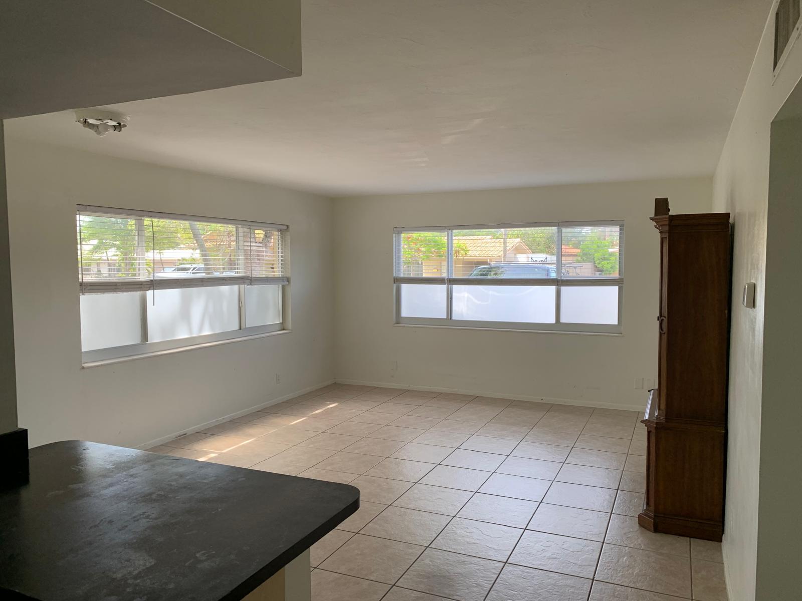 EXTRA LARGE 1 BEDROOM, 1 BATH CORNER UNIT IN EAST FORT LAUDERDALE JUST MINUTES FROM THE BEACH! SPACIOUS, UPDATED, AND WELL-MAINTAINED UNIT FEATURING TILE FLOORS THROUGHOUT, NEWER KITCHEN AND BATHROOM, LARGE WALK-IN CLOSET, AND A BRIGHT OPEN LAYOUT WITH PLENTY OF NATURAL LIGHT. MODERN KITCHEN WITH AMPLE CABINET SPACE AND OPEN COUNTER AREA PERFECT FOR ENTERTAINING. QUIET BUILDING IN A PRIME LOCATION CLOSE TO CORAL RIDGE MALL, PUBLIX, SHOPPING, DINING, AND THE GALT MILE BEACH AREA. UNIT WILL BE RENTED UNFURNISHED. MINIMUM 650 CREDIT SCORE REQUIRED. TENANT MUST SHOW INCOME OF AT LEAST 2.5 TIMES THE MONTHLY RENT. NO PRIOR EVICTIONS. RENTAL APPLICATION, SUPPORTING DOCUMENTS, AND ASSOCIATION APPLICATION REQUIRED AT TIME OF CTL.  provide full package, rent spree accepted, building will do their own credit background. Rental history, proof of income, identification, credit score to be provided with CONTRACT TO LEASE , when you are sending an offer please.