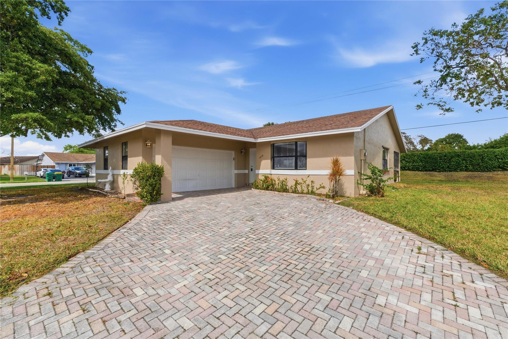 Welcome to this charming 3-bedroom, 2-bathroom home located in the desirable Calico Country community in Tamarac. This residence features an open kitchen that flows seamlessly into the main living areas, creating a bright and inviting space perfect for everyday living and entertaining. Enjoy relaxing mornings or peaceful evenings in the screened-in patio, offering comfort and privacy year-round. Ideally situated in an excellent location close to shopping, dining, and major roadways. Calico Country offers a beautiful community pool and well-maintained surroundings. Low HOA of just $135 per month makes this an incredible value.