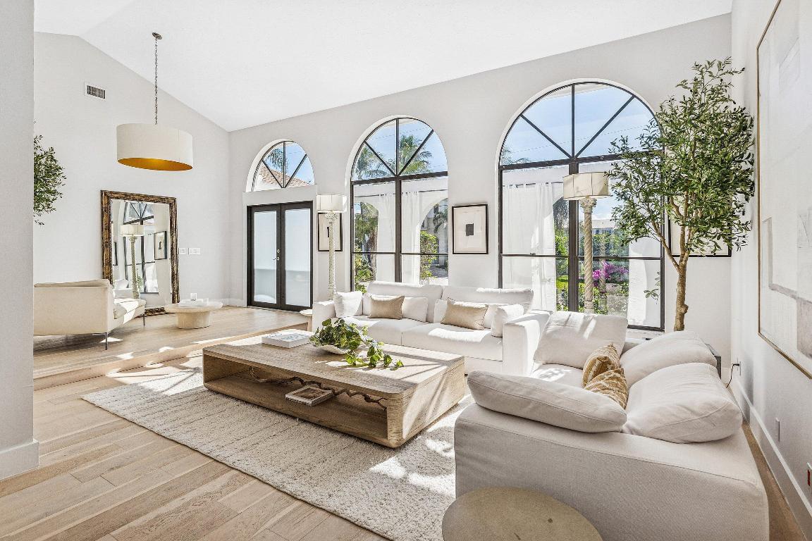 Completely renovated one-story home in the highly sought-after coastal town of Ocean Ridge, just steps to deeded beach access and Old Ocean Boulevard. 
This stunning 3-bedroom, 2-bath residence with a 2-car garage has been thoughtfully redesigned and shows like a model home. Recent upgrades include freshly painted interior and exterior, new wood flooring throughout, a brand-new kitchen with custom cabinetry, quartzite countertops, and new appliances, updated laundry cabinetry, beautifully renovated bathrooms, new doors, hardware, and baseboards. The home features high ceilings, a wide-open floor plan, and an oversized primary suite. Professionally landscaped with new sod, the outdoor space is equally impressive. Ideally located along Ocean Ridge's exclusive mile-and-a-half stretch ocean on one side, luxury homes on the other with no private parking and a true neighborhood beach feel. Centrally positioned between Palm Beach and Atlantic Avenue in Delray Beach, offering one of the best values in all of South Florida. A rare opportunity to own a turnkey coastal retreat in an unparalleled location.