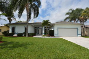 Gorgeous pool home with a incredible layout for entertaining family & friends.Serve the pool party from the spacious kitchen with cook island and tons of cabinet/counter space. Great sized bedrooms throughout home. Custom real fireplace in great room is complimented with high ceilings & breakfast bar overlooking pool area. The huge covered patio outside is designed for entertainment. Flat screen TV stays for your enjoyment of year around fun in the huge pool/spa with privacy fence & tropical landscaping. Pool & deck is like new and was refinished in 2013. New roof & A/C in 2005. New refrigerator in 2013. Must see this home before its too late!