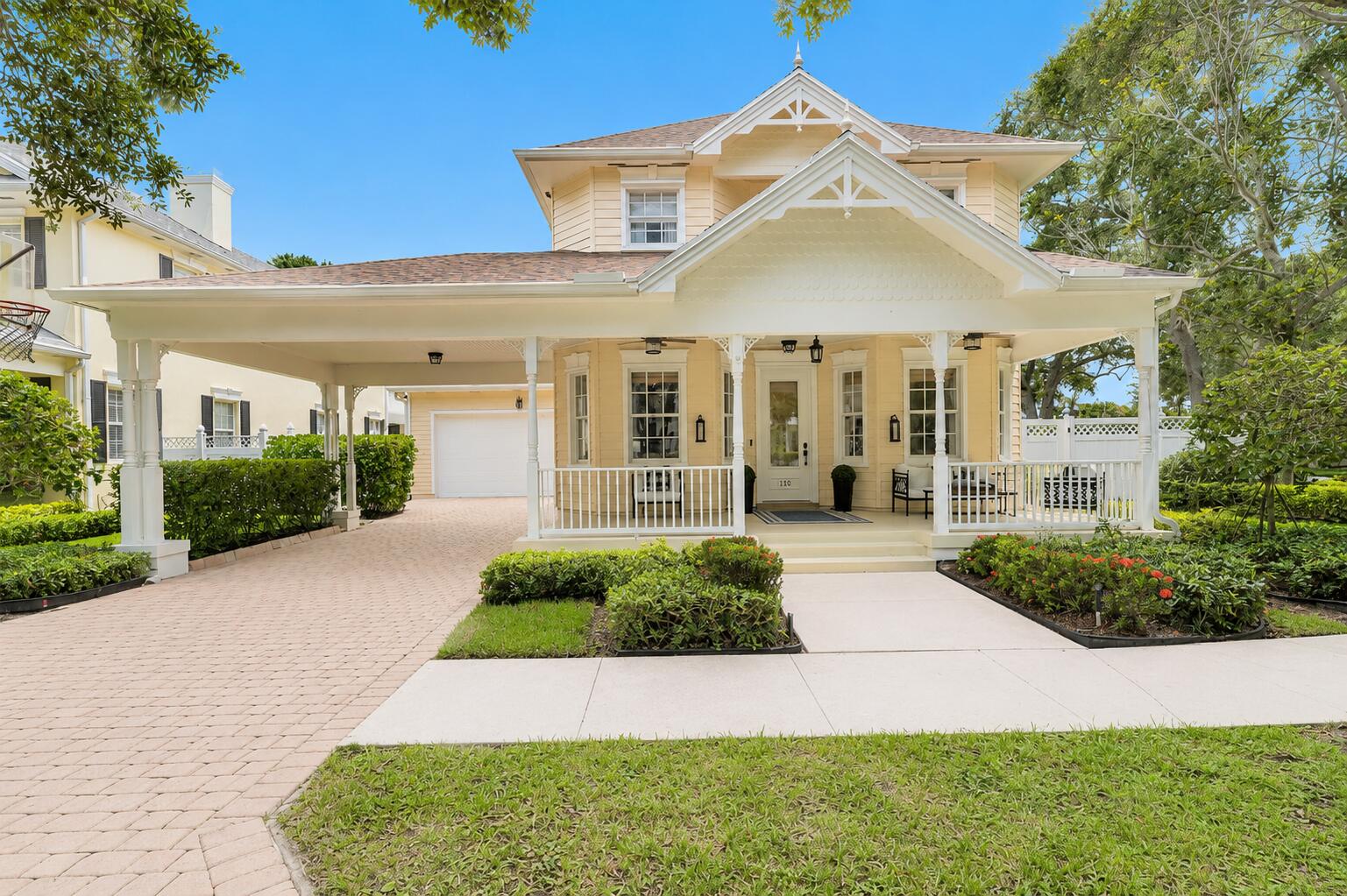 Welcome to 110 Sweet Bay Circle, a beautifully maintained 4-bedroom plus office/flex room, 3-bath pool home situated on one of the most picturesque tree-lined streets in Newhaven at Abacoa. Currently utilized as a fifth bedroom, the versatile office offers endless possibilities as a guest room, home office, playroom, or flex space to suit your family's evolving needs. Thoughtfully redesigned for both everyday living and effortless entertaining, this custom-modified floor plan is one of the few of its kind in Newhaven, offering rare open sightlines from the front entry through the main living areas to the backyard retreat. The seamless flow, abundant natural light, and connection between indoor and outdoor living create an exceptional setting for gathering with family and friends. The beautifully appointed kitchen blends timeless design with everyday functionality, featuring a premium Monogram appliance package, custom white shaker cabinetry with built-in organization, quartz countertops, an imported Italian marble backsplash, and an oversized island that serves as the heart of the home. Additional enhancements include custom built-in closet systems, enhanced HVAC efficiency with additional return vents, HVAC UV-C germicidal air purification lights, Nest thermostats, dual A/C systems under warranty, a commercial hybrid water heater, and a 2020 roof with a LeafGuard® gutter protection system. Beyond the impact-rated sliding glass doors, the private backyard has been thoughtfully transformed into a true outdoor retreat featuring a beautifully resurfaced saltwater pool with updated pool equipment, 24-inch travertine pavers, synthetic pet-friendly turf, French drains, mature landscaping, and an outdoor Sonos speaker system—designed for year-round enjoyment and effortless entertaining. Ideally located in the heart of Newhaven, residents enjoy charming front porches, parks, playgrounds, walking trails, and convenient access to Downtown Abacoa, Roger Dean Stadium, top-rated schools, shopping, dining, beaches, golf courses, and I-95. More than just a beautifully updated home, 110 Sweet Bay Circle offers a rare combination of thoughtful design, quality craftsmanship, and a neighborhood where front porches, lifelong friendships, and lasting memories remain part of everyday life.