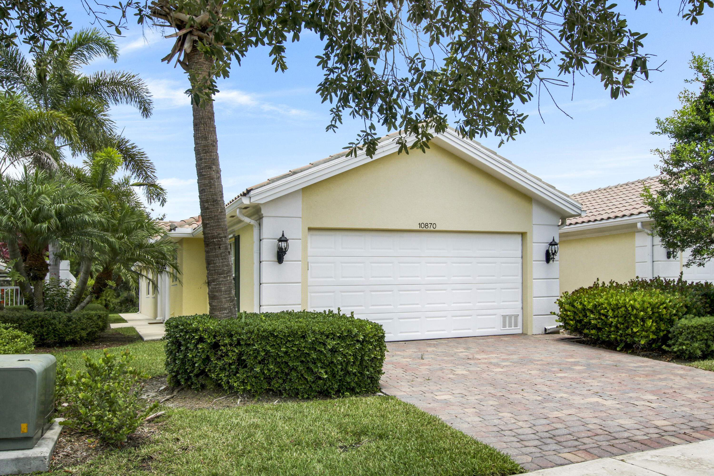 Welcome to this charming 2-bedroom, 2-bathroom villa located in Lakes of Tradition in Port St. Lucie. This single-story residence offers 1,680 square feet of finished living space, providing comfortable and efficient layouts for everyday living. The two-car garage provides convenient parking and storage solutions for your vehicles and belongings. This villa presents an excellent opportunity for those seeking a low-maintenance lifestyle in an established community.  Located near all of the shopping and restaurants in Tradition Square makes this an ideal place to call home. The Capri Floorplan offers two primary suites with an open floorplan. Overlooking a beautiful and serene preserve to sit and watch nature in your backyard. The clubhouse offers 2 pools, fitness room, card room and more