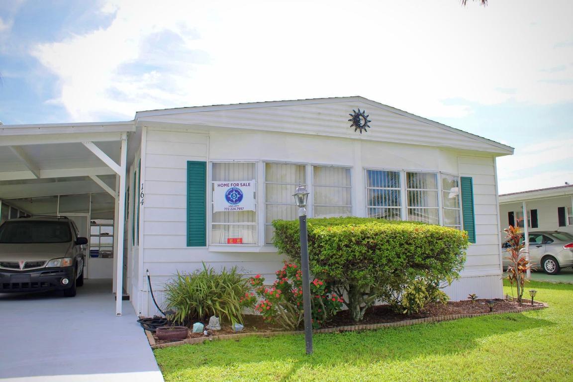 PRICE Drop $10,000!!!!  Brand New Roof!!!  This Absolutely Immaculate, very well maintained 2Bed 2Bath is back on the market! The AC 7yrs old, Re-painted home exterior 2 yrs ago, Power washed home exterior 6 months ago, drive redone, Regular pest maintenance, gardening monthly, won't Last on the market! The Best is yet to come..... This Home has been given by Spanish Lakes a Gold Star! No list will be required at close!
