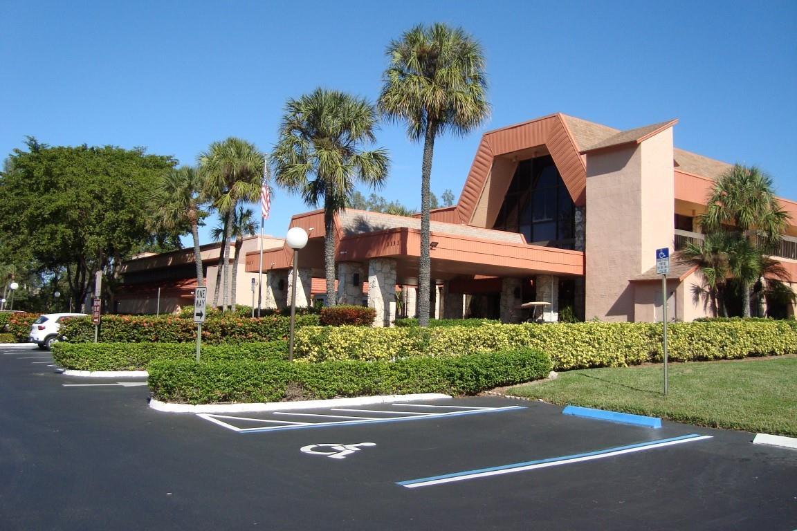PERFECT LOCATION! WELL MANAGED COMPLEX. DELGHTFUL AND UPGRADED GROUND FLOOR UNIT. UPGRADED KITCHEN,FLOOR COVERINGS, BATHROOM. SPACIOUS ADDITIOAL DEN AREA , PLUS LIVING- DINING AREA. DEN AREA CAN BE MULTI-PURPOSE USAGE-OFFICE, GYM, MUSIC ROOM. AIR CONDITIONER AND APPLIANCES FAIRLY NEW (2024). COMMUNITY BOASTS TENNIS, HUGE - HUGE POOL AND DECK, BARBECUE, LIBRARY, FITNESS CENTER WITH LOTS OF  GYM EQUIPMENT, SAUNA, BALLROOM, AEROBIC CLASSES, TIKI-HUTS, CLEAN PROFESSIONALLY LANDSCAPED COMMUNITY. FIBER-OPTIC INTERNET  TV SERVICE INCLUDED IN MAINTENANCE.  SIX MONTHS MAINTENANCE DUE AND ESCROWED AT CLOSING. REFUNDED AFTER 18 MONTHS. MAINTENANCE INCLUDES BUILDING, INSURANCE, TRASH ,WATER, COMMON AREAS. HUGE PARKING LOTS . NO RENTALS ALLOWED, 55+ COMMUNITY.
