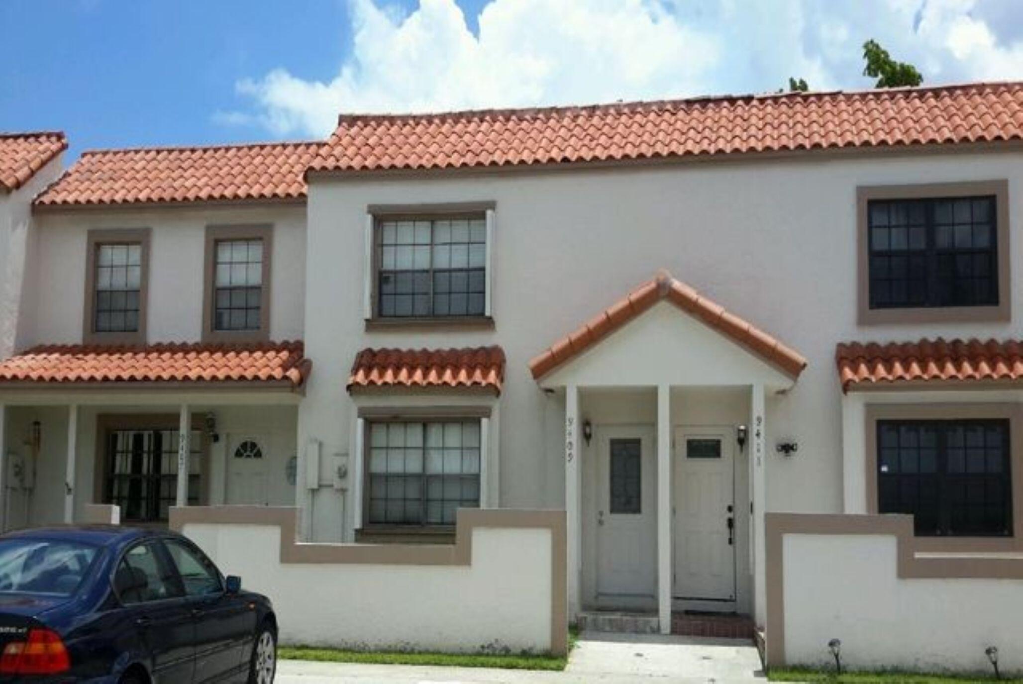 Inviting 3 bed, 2.5 bath townhouse offering a comfortable and functional layout with tile floors on the ground level and laminate flooring on the staircase and upper floor. The half bath is conveniently located on the ground level, as well as the newer washer and dryer for added ease. A screened in patio overlooks peaceful garden and canal views, an ideal spot to unwind.  Accordion shutters make hurricane season preparation simple and efficient. Two assigned parking spaces right at your front door. Some photos may have been enhanced. Any questions pertaining to association please reach out to management.