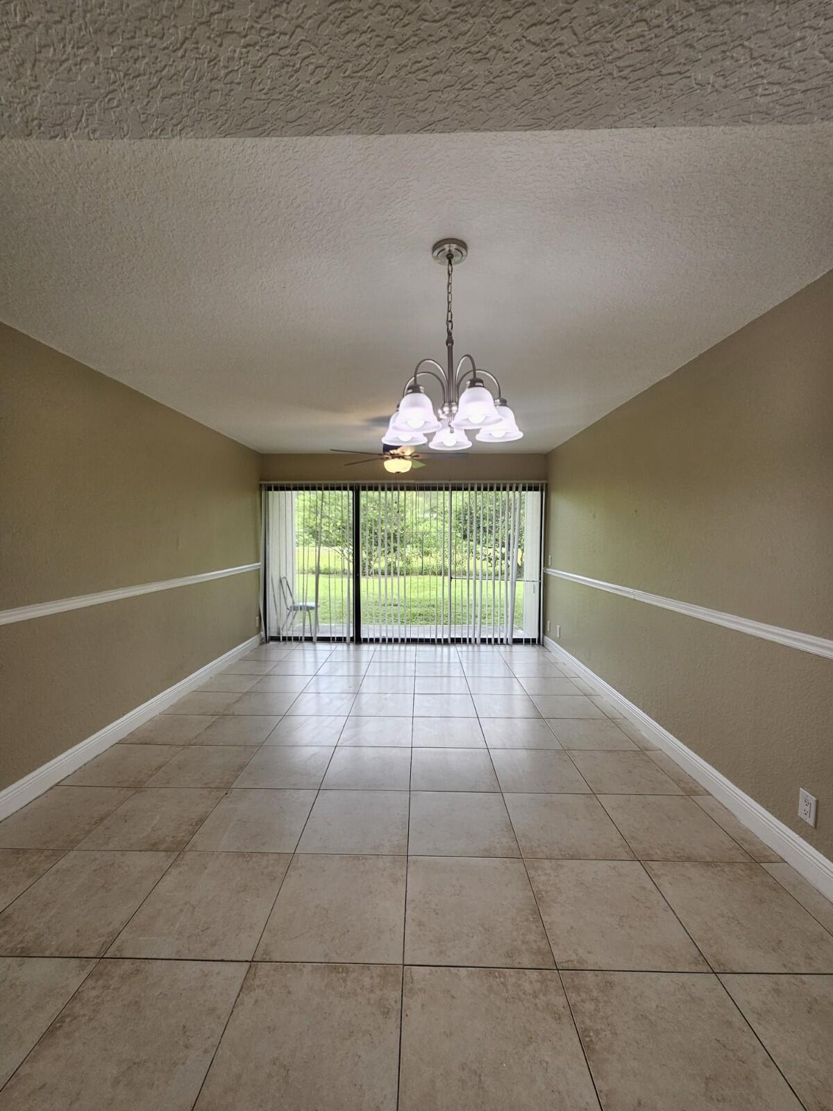 Beautiful 3-bedroom, 2-bathroom first-floor condo located in the desirable Palm Beach Place community. This spacious unit features ceramic tile flooring throughout the living areas and bathrooms, brand-new laminate flooring in all bedrooms, stainless steel appliances, granite countertops, decorative ceiling fans, and a full-size in-unit washer and dryer. The open floor plan offers comfortable living spaces and generously sized bedrooms. Residents enjoy resort-style amenities including a swimming pool, fitness center, clubhouse, scenic lakes, and onsite management. Conveniently located just minutes from the Florida Turnpike, I-95, shopping, dining, schools, and entertainment. Don't miss this fantastic rental opportunity—schedule your showing today!