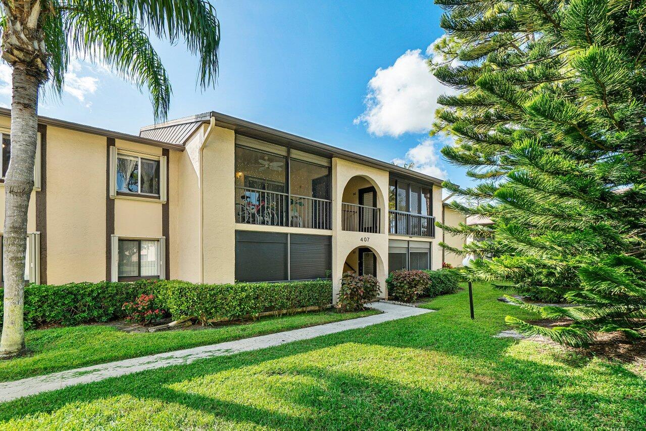 Welcome to your ultimate haven of comfort and convenience located in the 55+ Community of  Pine Ridge South IV! Step into this meticulously curated condo and experience a lifestyle of luxury and ease. The kitchen boasts modern convenience with an ice cube fridge featuring filtered water, ensuring refreshing hydration at your fingertips. Sink into blissful relaxation on the genuine soft Italian leather sofa, love seat, and major chair, complete with bolster for extra comfort. Enjoy peace of mind with roll-down steel lanai protectors, providing added security and privacy to your outdoor oasis.  Work and entertainment seamlessly blend in the designated office area, featuring a complete wooden secretary enclosing a large screen TV and office materials for productivity and leisure. The TV and modem are readily available for immediate use Nestled in a serene garden location, enjoy the tranquility and privacy afforded by this charming setting. Outside your door awaits a plethora of amenities, including an Olympic-size pool for leisurely swims and rejuvenating dips. Golf enthusiasts will appreciate the proximity to renowned golf courses, while beach lovers can indulge in seaside adventures just a 15-minute drive away.Convenience is key with restaurants and shopping options within close reach, making dining and errands a breeze. Well-connected to all major routes, including I-95, commuting and travel are streamlined for your convenience. Additionally, the proximity to parks, golf courses, pickleball courts, and art classes ensures a vibrant and active lifestyle for all. Just a 20 minute drive to Palm Beach International Airport. Don't miss the opportunity to make this exquisite condo your new home!