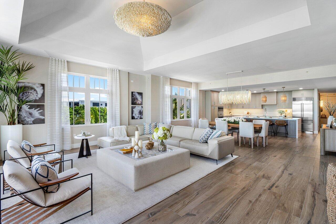 Now offered for immediate delivery, this newly completed waterfront residence at HAVN Residences & Yacht Club presents a rare, move-in-ready opportunity. Residence B is an exceptionally large, direct waterfront 2BR plus expansive den with a flow-through layout and soaring ceilings, capturing sweeping views of the private marina, resort-style pool, and landscaped gardens. Fully modern, high-end buildouts elevate both everyday living and entertaining. HAVN residents enjoy private marina access, a fitness center, branded beach cruisers, and a house golf cart providing service to the Palm Beach Shores resident beach and nearby points of interest. Photos shown are from a staged model, illustrating the potential for a fully decorated, upgraded residence