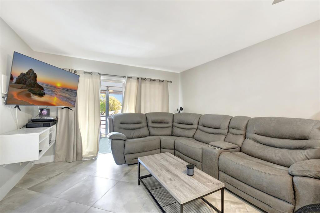 Welcome to this beautiful well maintained  2/2 condo in the heart of Coral Springs. This inviting unit features a newly updated kitchen with modern finishes. The spacious layout offer lots of natural light creating a warm atmosphere throughout. Ideally located just a 1 minute drive to Downtown Coral Springs, you can also enjoy a short walk to Celebration Grounds, where community events like food trucks and live music bring the neighborhood to life. Prefer a staycation? Take advantage of the heated community pool or host gatherings at the club house, complete with a BBQ grill, gazebo, and plenty of seating for friends and family.  The HOA includes water and trash adding extra value. SELLER MAY CONSIDER BUYER CREDITS