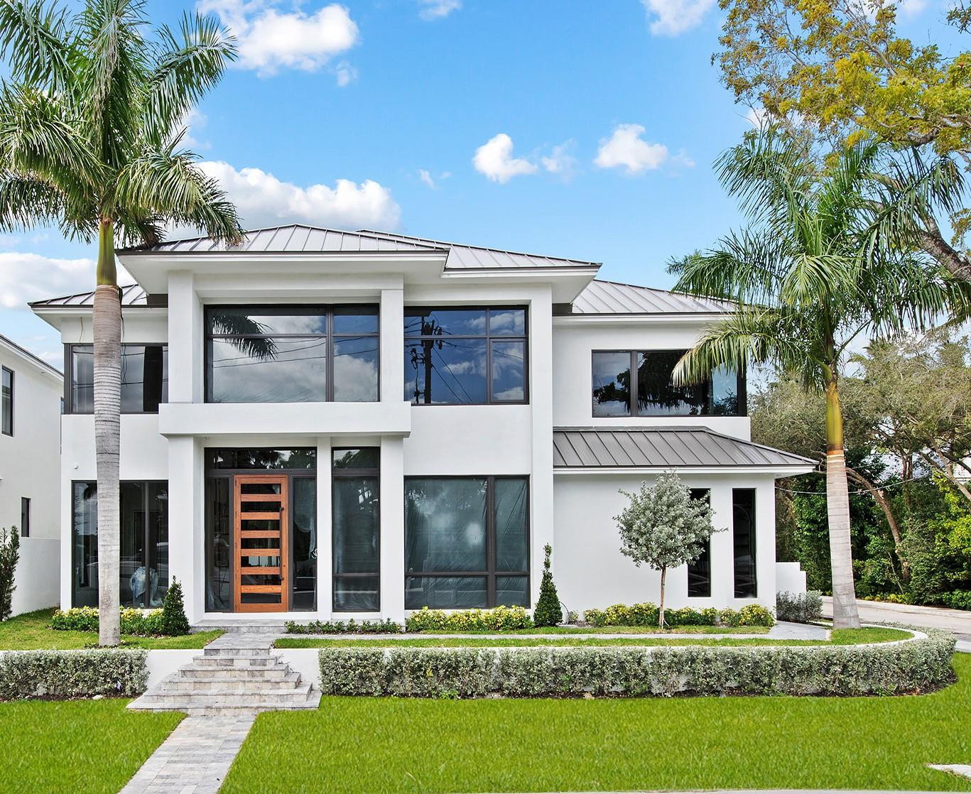 NEW CONSTRUCTION with waterway views. Ideal for boating, new dockage, no fixed bridges & mins. to the Intracoastal & Ocean. Introducing Rio Vista's newest luxury residence inspired by modern architecture & clean lines. Soaring ceilings & enormous windows illuminate the open floor plan, while multiple doorways blend indoor & outdoor living spaces. The commanding foyer & floating stairway encased in glass opens to a 2 story great rm. & formal dining rm. w/wine storage & wet bar. A culinary kitchen with upgraded appliances, gas cooktop, tremendous counter space, center island & breakfast area. 1st floor home office (or optional 5th br). Enormous primary suite w/2 walk-in closets & spa inspired bathrm. En-suite bedrms & 2nd floor laundry rm. Tropical pool with sun shelf. Sq ft from architect.