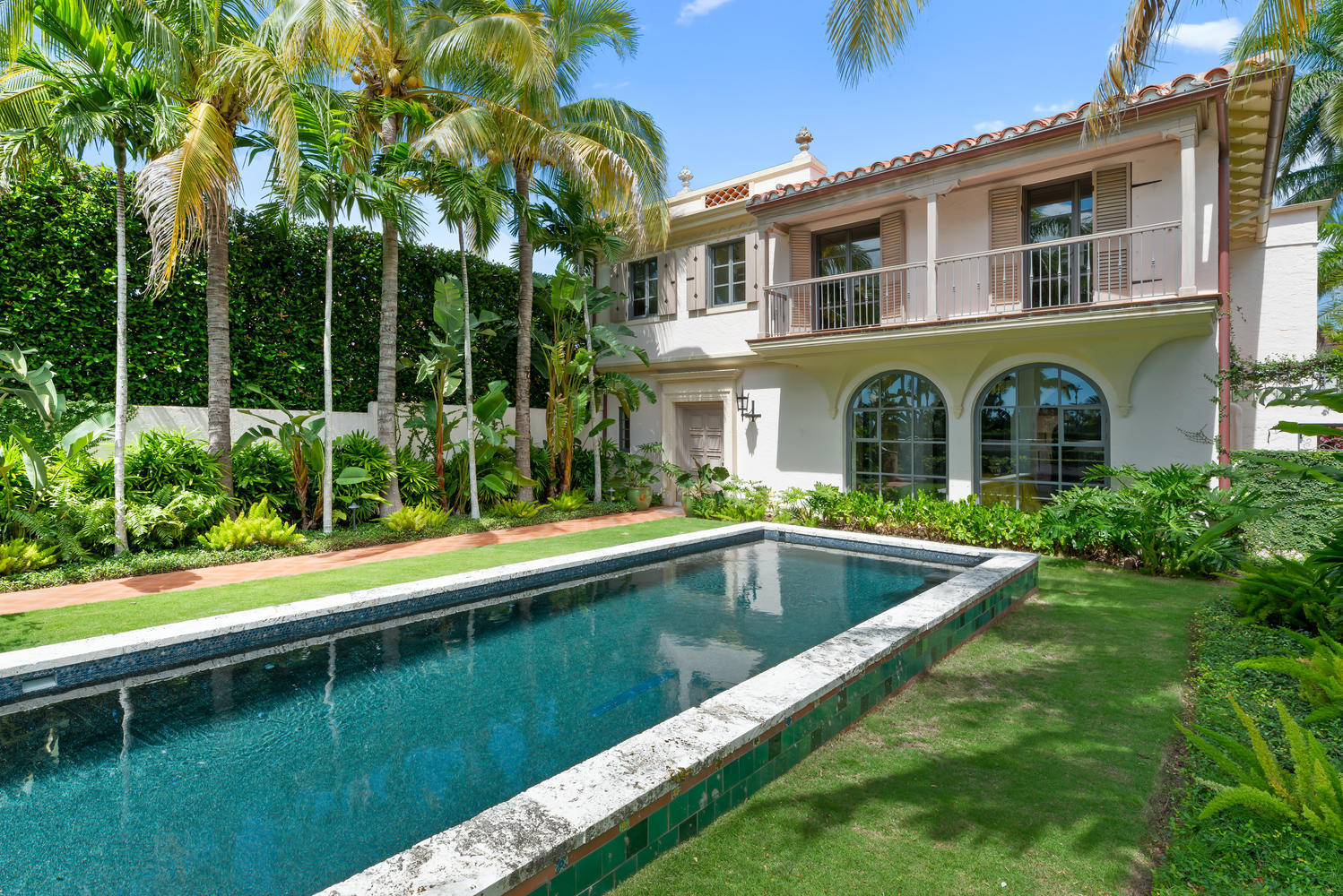Rare in-town residence, new to market and move-in ready. Classic Palm Beach design located on a private street but just steps from the iconic Worth Avenue's world class shops and restaurants. The house sits across from the Everglades golf course, and is a block to the beach, yacht marina, park, and all daily amenities. This 4 bedroom, 4 1/2 bathroom residence has been exquisitely renovated by Fairfax & Sammons Architects with all new top of the line systems. It features two double Master suites, with private terraces and balconies. Authentic Palm Beach charm on the best street in town. Priced to sell.