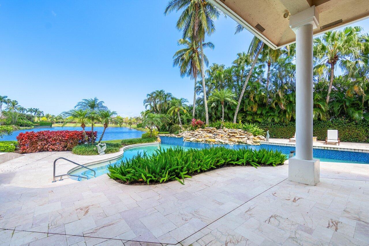 Enjoy the most breathtaking panoramic lake views that sit on this 1/2 acre very private lot in Frenchman's Creek. Floor to ceiling windows allows an abundance of natural light throughout this spacious 4 beds + den, 5.1 Bathroom home with over 5,000 sq ft and offering a newer roof. Large heated pool/spa surrounded by perfectly placed landscaping and stunning water views. The expansive master suite features a wall of windows displaying the gorgeous views, 2 customized walk in closets, enormous primary bath with two showers and two water closets, and transom windows continuing the flow of natural light highlighted. 3 car garage, wood fireplace, open floor plan, volume ceilings, updated A/C units. Frenchman's Creek offers two championship golf courses, low density of just over 600 homes for (2) 18 hole championship golf courses allowing for an enjoyable, leisurely golfing experience. Private and exclusive Beach Club includes shuttle service, Restaurant, Chairs and Umbrellas on the Sand and heated pool 5 mins away on beautiful Juno Beach. One full golf membership allows access access to all on site amenities. Planned for 2025 is a brand new state of the art clubhouse to rival all in this area and currently the community boasts a Fitness Center, spa, on-site dining pavilion, Tennis, Pickleball, Pool, Beachclub, numerous dining options, navigable waterways for select properties, social events and so much more. Luxury concierge lifestyle at its​​‌​​​​‌​‌​​​‌‌​​​‌‌‌​​‌​​‌‌​​​​ best.