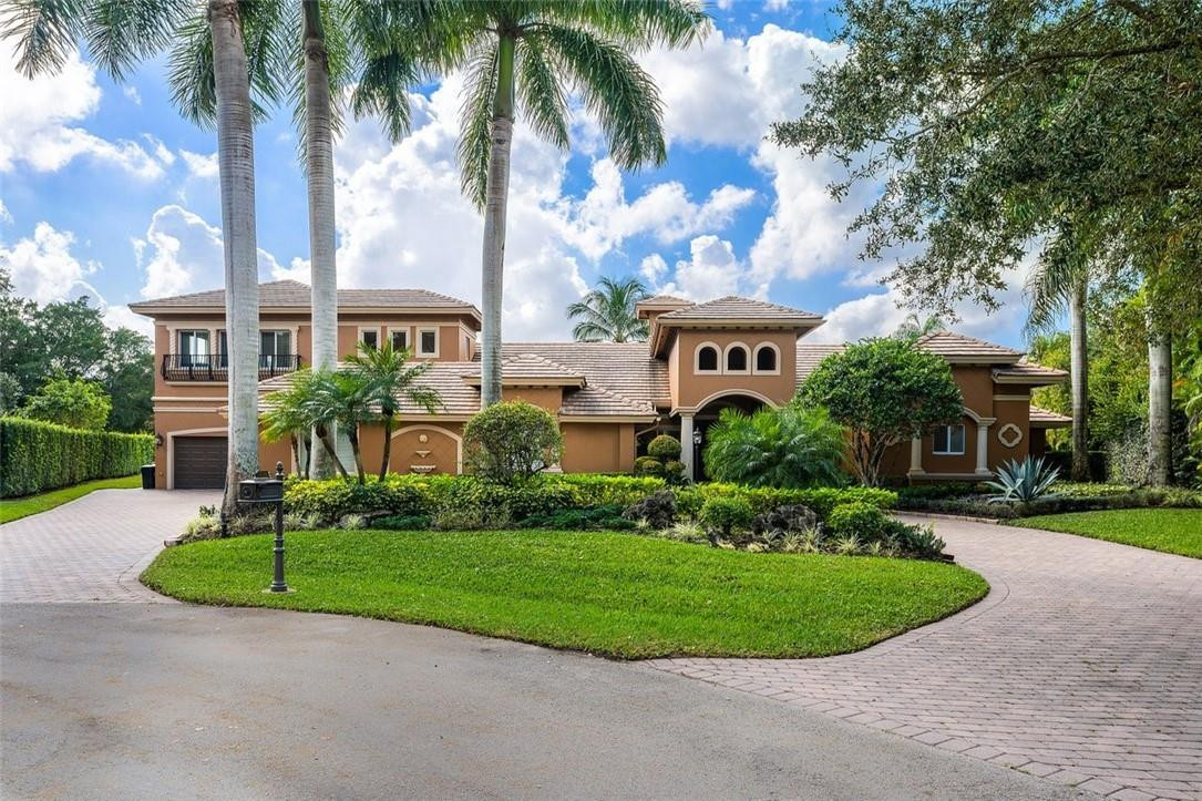 Simply a stunning & commanding estate within a highly exclusive community. Dramatic yet Light via walls of impact glass. Completely reconstructed in 2004. With 7,911 total Sq. Ft., lighted tennis court, 4 car garage, resort-style pool with waterfalls & slides, office, gym, au pair suite, huge loft, billiard room, craft room, butlers pantry, fireplace, gazebo, sprawling lot & a location within a quiet cul-de-sac, this home is a luxurious & private retreat. The kitchen is impressive in size, with glorious butted glass windows, top-of-the-line appliances, a large island, granite, pot filler, & fine wood cabinetry. The Sublime owner's suite is expansive & features a spa-like bathroom. Large living areas and a flexible floorplan lend for endless possibilities. Updates & Upgrades in attachments This Estate offers everything needed for a luxurious  "Work, Play Where You Live Lifestyle"! Perfect for gathering with family and friends. Can accommodate multi-generation households. Located in one of Parkland's most exclusive communities with great amenities.