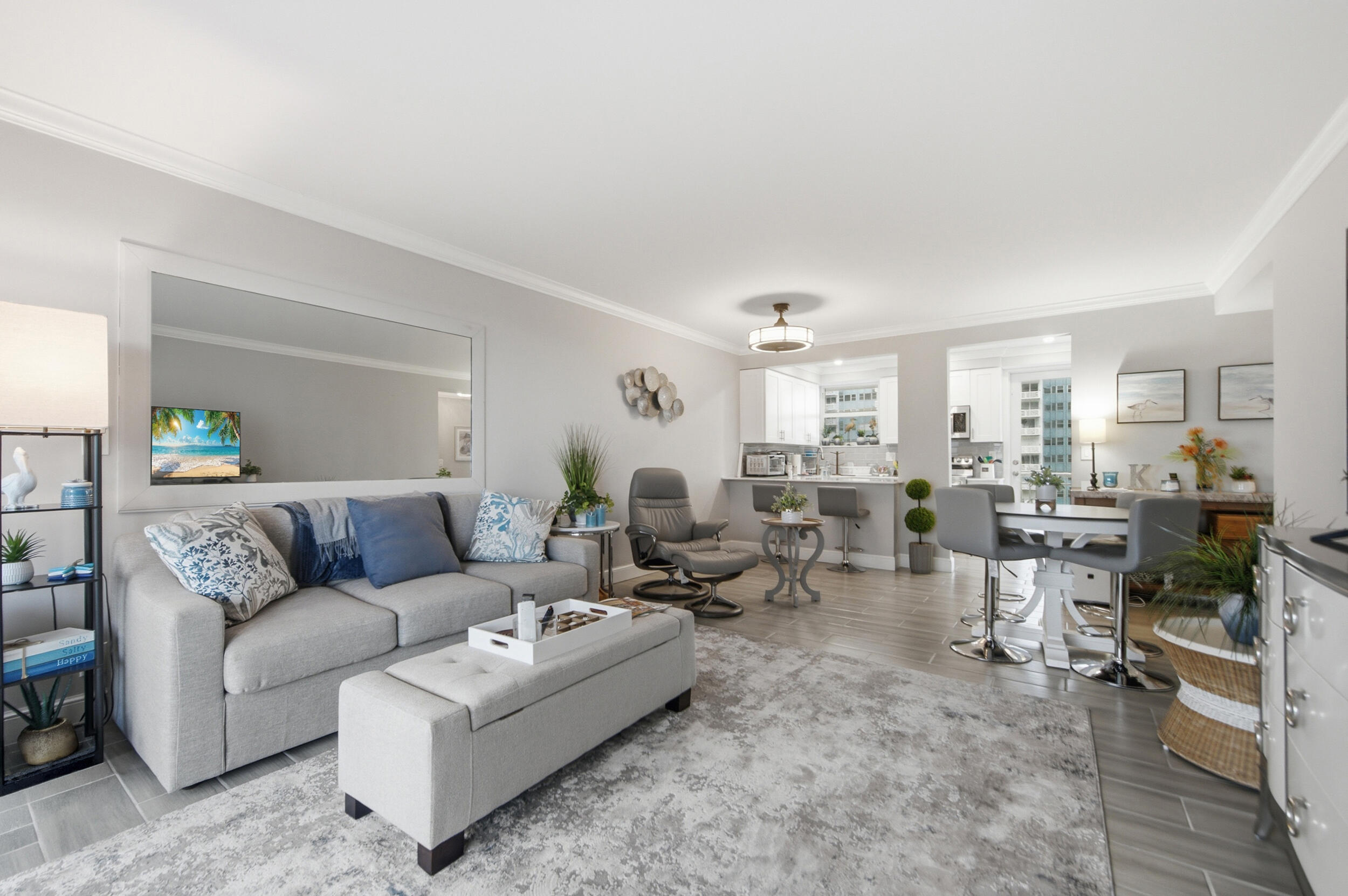 Beautifully renovated 1/1 co-op just steps from one of South Florida's largest beaches. This tastefully updated unit features an open-concept living area, fully remodeled kitchen with stone countertops, stainless steel appliances, and custom white cabinetry, plus a private balcony with open city and pool views. Mini-split A/C throughout. Atlantic Towers is ideally situated in the Harbor Inlet area directly across from Port Everglades, with easy access to Las Olas, world-class dining, shopping, and groceries. Minutes to Fort Lauderdale-Hollywood International Airport. Building has passed all required inspections with a new fire system and relined major pipes. 650+ credit score required. Association approval required. No subleasing permitted.