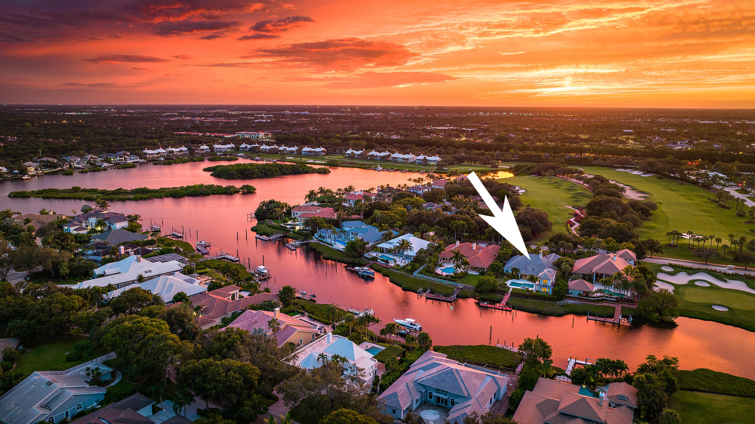 Waterfront Estate Home - This property is conveniently located close to the entrance and The Club with dockage that is within minutes to the Intracoastal. 4 large guest suites with private bath, oversized closets plus den/office Murphy bed, lavish primary suite with sitting room, 2 separate full baths and closets, fabulous views of interior waterway, open kitchen to family room and breakfast area, living room with coral fireplace, tons of rear yard with pool and patio. Make this home your own!