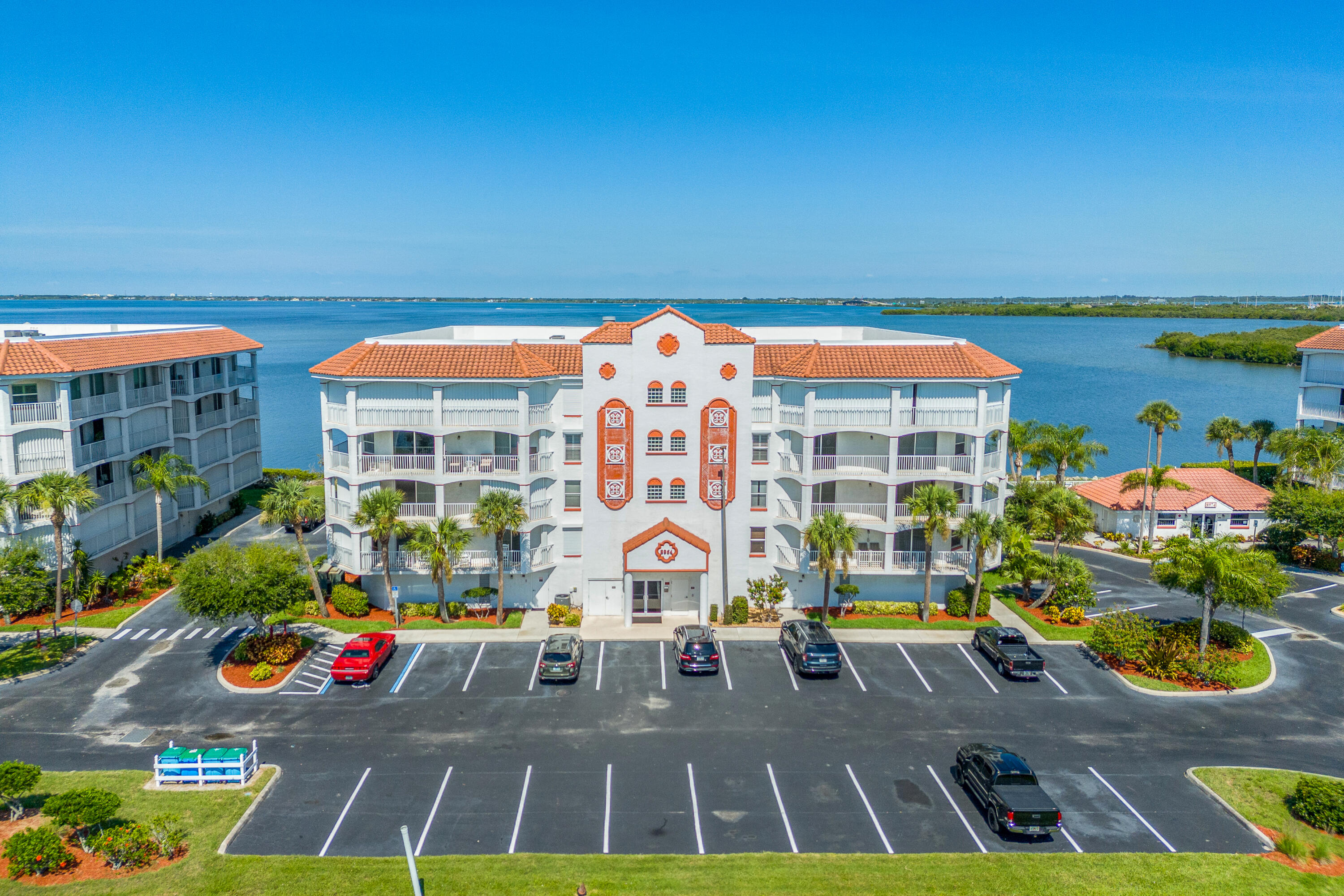 MULTI-FAMILY INFILL OPPORTUNTY 112 UNITS. Positioned within the Economic Overlay District of Cape Canaveral, the subject property represents a fully entitled ±7.5-acre multifamily development opportunity consisting of seven approved mid-rise residential pads. Each development pad encompasses approximately ±1 acre or greater and is approved for a four-story multifamily structure to a maximum building height of 45 feet. Current entitlements allow for 16 residential units per building, totaling 112 approved multifamily units across the site. All horizontal infrastructure improvements are in place, including paved roadways, municipal water, sanitary sewer, electrical service, drainage, and utility connectivity, allowing for immediate vertical development execution.  Positioned near the final undeveloped waterfront corridor within Cape Canaveral and neighboring the Banana River, the asset is surrounded by an established coastal residential and hospitality corridor comprised of condominium communities, hotels, mixed-use assets, and multifamily developments. The project benefits from exceptional regional connectivity and a highly desirable coastal backdrop highlighted by world-famous Port Canaveral, the Intracoastal Waterway, and the Atlantic Ocean beaches, positioning the development within one of Central Florida's most supply-constrained and rapidly appreciating waterfront submarkets.