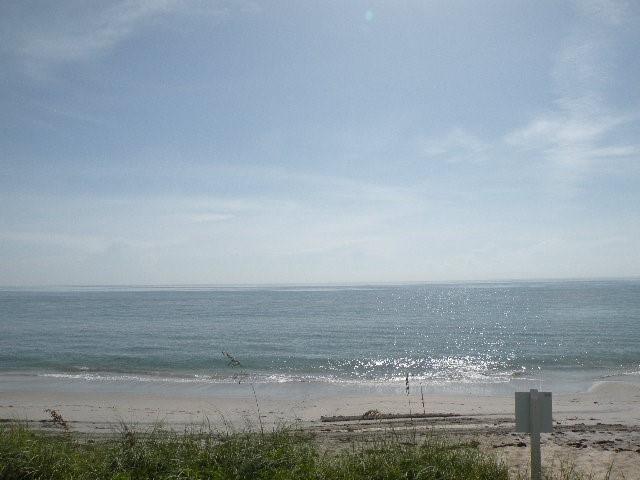 Welcome to paradise. Steps to Ocean. Gated community has private gazebo located on 200 ft of beach. Surrounded by million dollar properties. Unit has tile throughout. Kitchen updates.