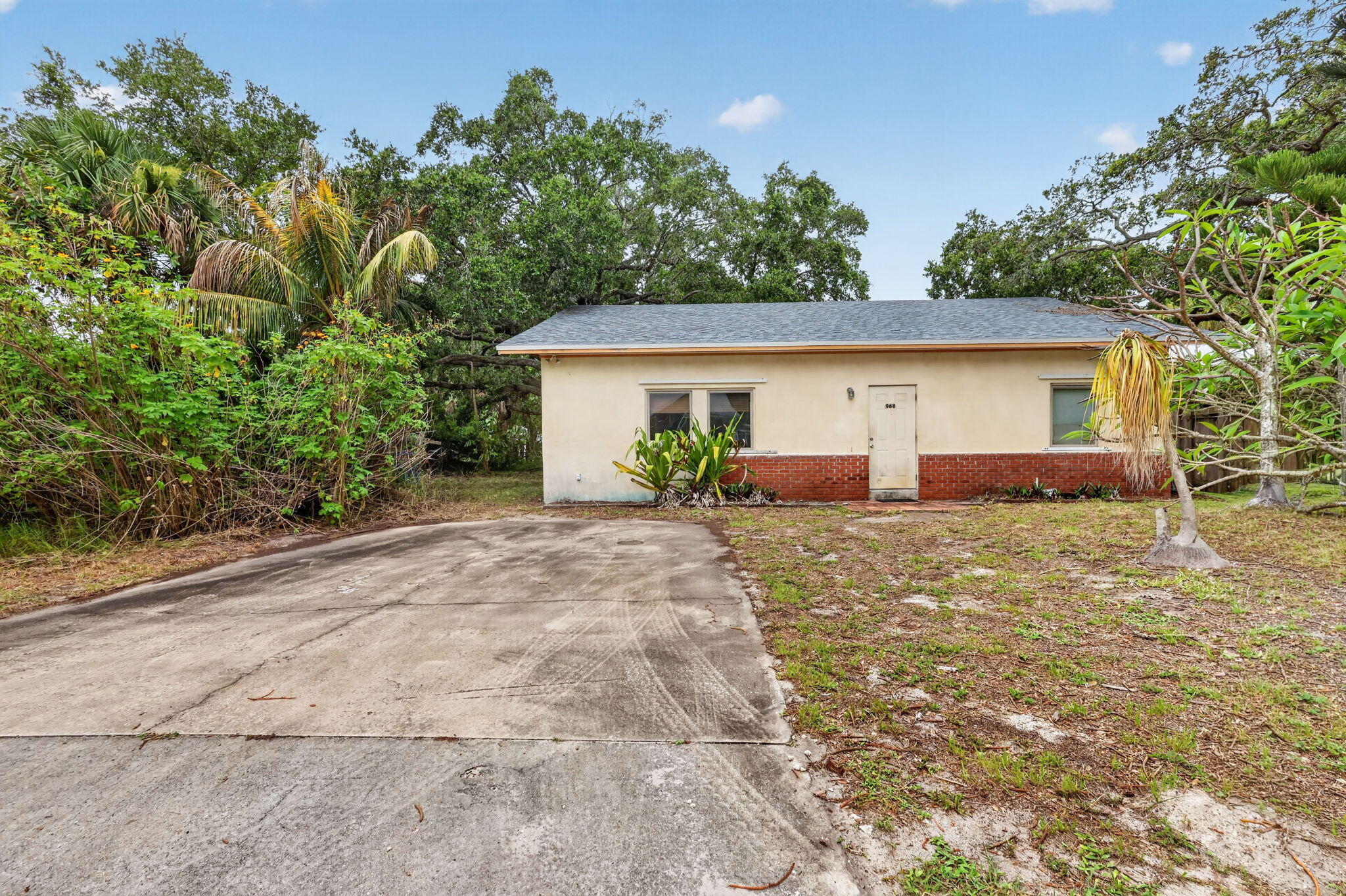 Roof Replaced in 2021! Exceptional opportunity for investors, renovators, or buyers looking to customize a home to their own style and vision. This 2-bedroom, 1.5-bath property is in need of significant renovations and updating, making it ideal for a Cash Buyer or a buyer utilizing a 203(k) Rehab Loan. With great bones and endless potential, this home offers the chance to create a charming primary residence, seasonal getaway, or investment property in a highly desirable location. Conveniently located near Downtown Jensen Beach, Downtown Stuart, shopping, dining, beautiful beaches, and US-1 for easy commuting and access to everyday conveniences. Bring your contractor and imagination — this property is ready for its transformation! Schedule On Line - this home is in need of major renovations and rehab but the bones are good!