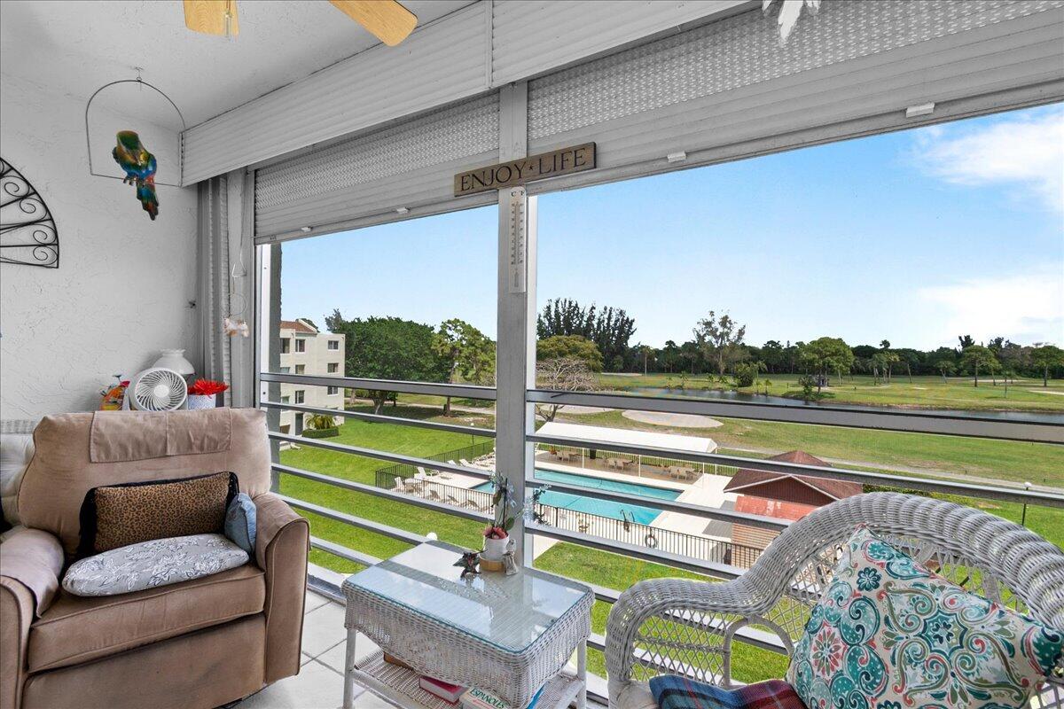 Rare Balcony Condo with Golf & Pool Views Poinciana 55+ Community, Lake Worth Beach. Welcome to one of the most coveted units in the Gramercy building — a beautifully maintained 2-bedroom, 2-bath condo on the 4th floor, and one of only two units in the building to feature a private balcony. Step outside and take in sweeping views of the sparkling pool and the lush 3rd hole of the community's scenic 18-hole golf course. Inside, enjoy the convenience of an in-unit washer and dryer, soaring 4th-floor elevation, and easy access via two building elevators. Gramercy residents also enjoy the exclusive use of their own dedicated pool — a quiet retreat just steps from your door. Poinciana's resort-style amenities are second to none.   Poinciana's resort-style amenities are second to none. The grand clubhouse features a full-service restaurant, fitness center, tennis courts, a resort pool, and a network of peaceful walking paths — all beautifully framed by an 18-hole golf course. Best of all, there are no social, tennis, or golf membership fees.  Located just minutes from major highways and premier shopping, you're also a short drive from the world-famous beaches of Lake Worth — known for breathtaking sunsets, a thriving dining scene, and a rich calendar of cultural events and entertainment.  This is more than a condo — it's a lifestyle upgrade.