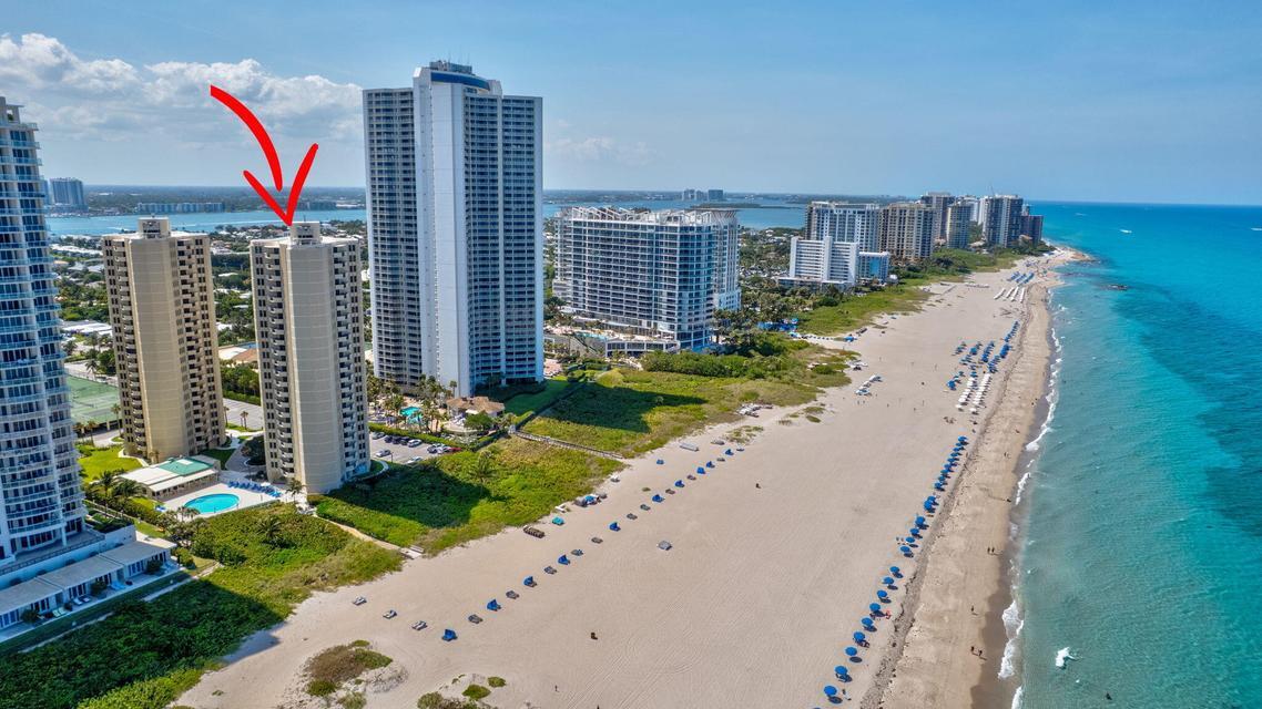 Welcome to your dream beach getaway!    Beautifully renovated 2 bath 2 Bedroom condominium offers 1,219 sq ft in a highly desirable Phoenix Towers on Singer Island.  No detail was overlooked in this top to bottom renovation.  Enjoy a custom designed kitchen featuring quartz counter tops, soft close cabinetry, stainless steel appliances, farm house sink, and an open inviting concept layout perfect for entertaining.  Bathrooms have been fully remodeled with Double vanity in master and two walk in showers.  Additional upgrades include tile floors throughout, fresh paint impact windows and doors lowered ceiling for recessed LED lighting, newly installed additional hot water heater updated trim and doors creating a move in ready