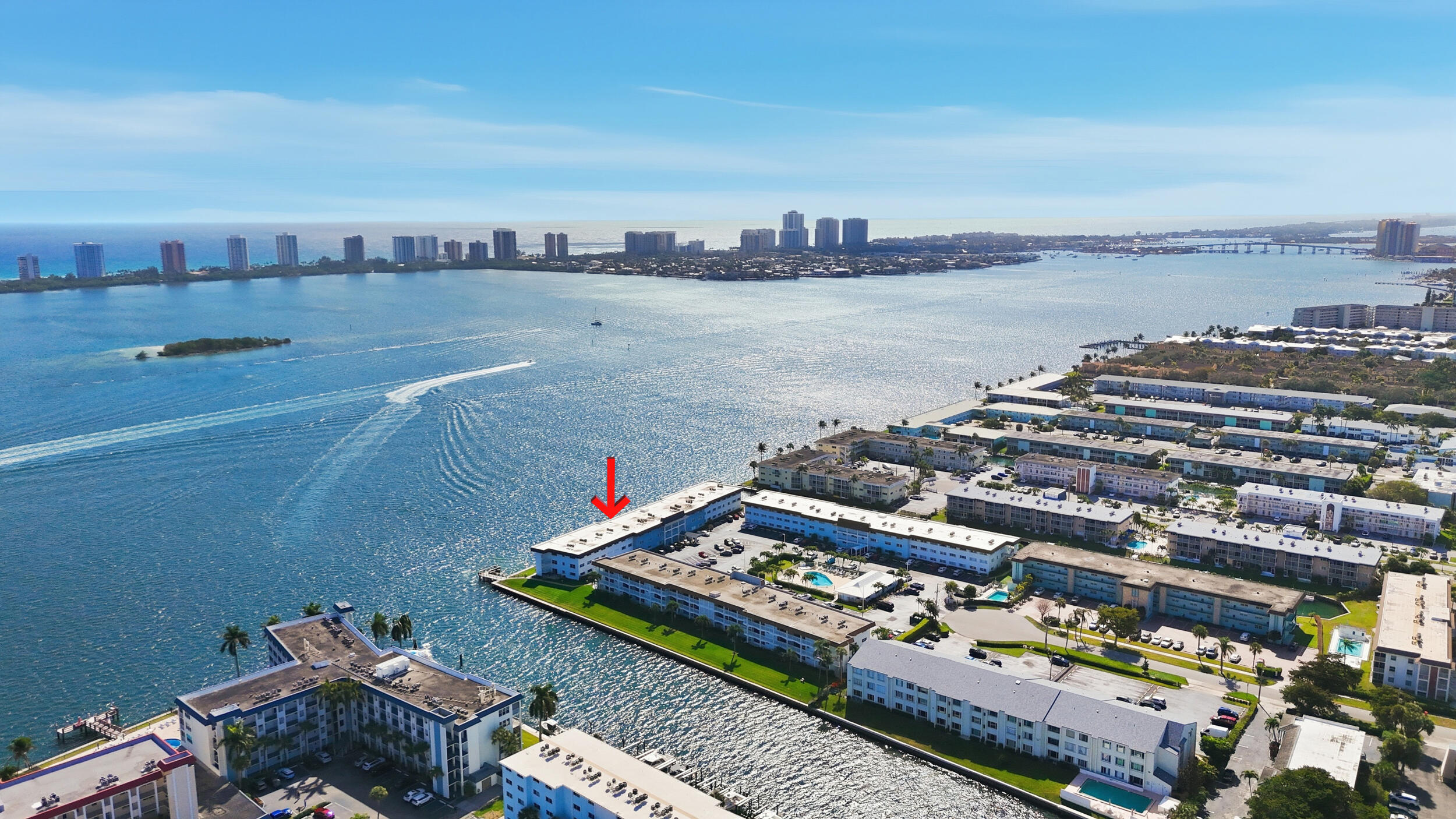 Wake up to million-dollar direct Intracoastal views of the waterway and Singer Island, with breathtaking views of sunsets over the Intracoastal. This well-maintained, move-in-ready co-op offers an open kitchen and great room, impact windows, and laminate flooring. Relax in the fully enclosed screened lanai with constant Intracoastal breezes. Amenities include a beautiful heated salt water community pool and clubhouse with function and exercise rooms, water, insurance building, water and basic cable. This move-in ready unit is situated in desirable locations with convenient access to amenities, beaches, restaurants, shopping, fishing, North Palm Beach Country Club & Golf Course. Live the waterfront lifestyle you've always dreamed of!
