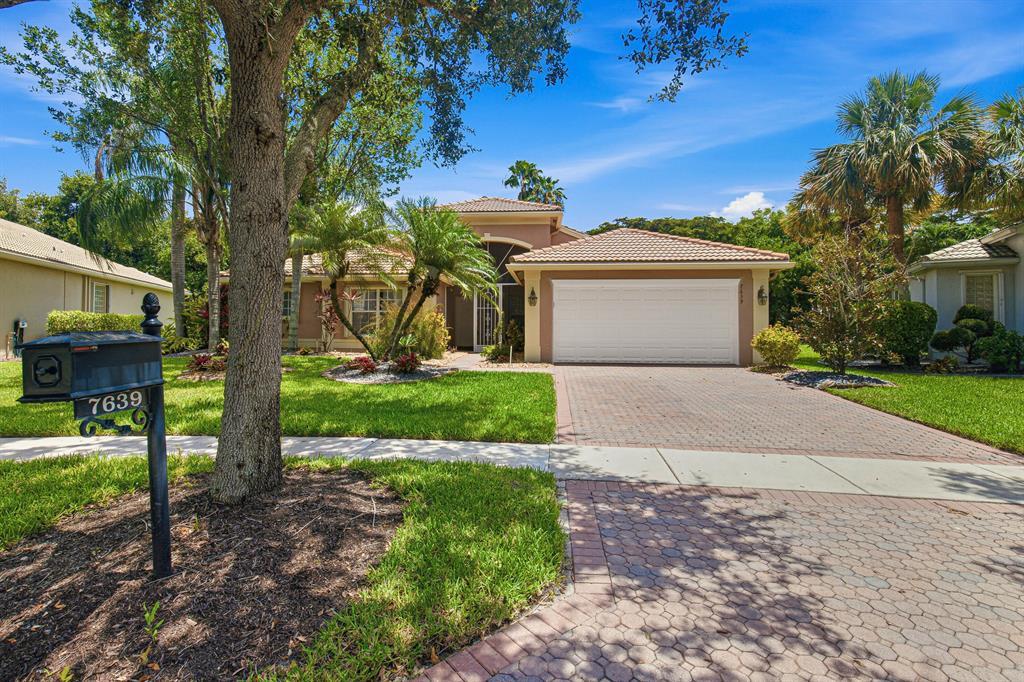 Freshly painted with tile flooring throughout, this spacious single-family home offers over 2,500 sq. ft. under air on an oversized pie-shaped lot. Aggressively priced for its size, it's an exceptional value in sought-after Valencia. Enjoy a premier resort lifestyle with 10 tennis courts, 6 pickleball courts, 3 bocce courts, indoor racquetball, a state-of-the-art fitness center, full-service Bistro, beauty salon, spectacular shows, multiple pools, hot tubs, and an active social calendar. Ideally located just steps from the clubhouse and amenities. HOA includes lawn care, exterior painting, roof cleaning, cable, high-speed internet, home security monitoring, annual Bistro credit, full use of amenities, and 24-hour manned gate.