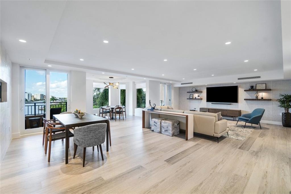 New Luxury designed 5468 SF waterfront residence, so expansive it feels like a single family home!  Intracoastal views from 5 terraces, as well as the artfully designed interior with an abundance of natural light throughout.  This one of a kind space has been remastered featuring a luxe main suite that occupies the SE wing & features 2 sitting areas, spa inspired ensuite w/ sauna, mini bar & custom closet.  Gourmet kitchen features Thermador appliances, spacious main living area has options for formal & informal spaces, see thru linear fireplace, wine wall, impact windows/doors & home gym.  Guest quarters can be closed off to main living and boasts its own private entrance w/ 3 suites/2 baths & lounge area.  Included: 60' deeded dock, 4 garage spots, 3 storage, 24/7 security, pet friendly!