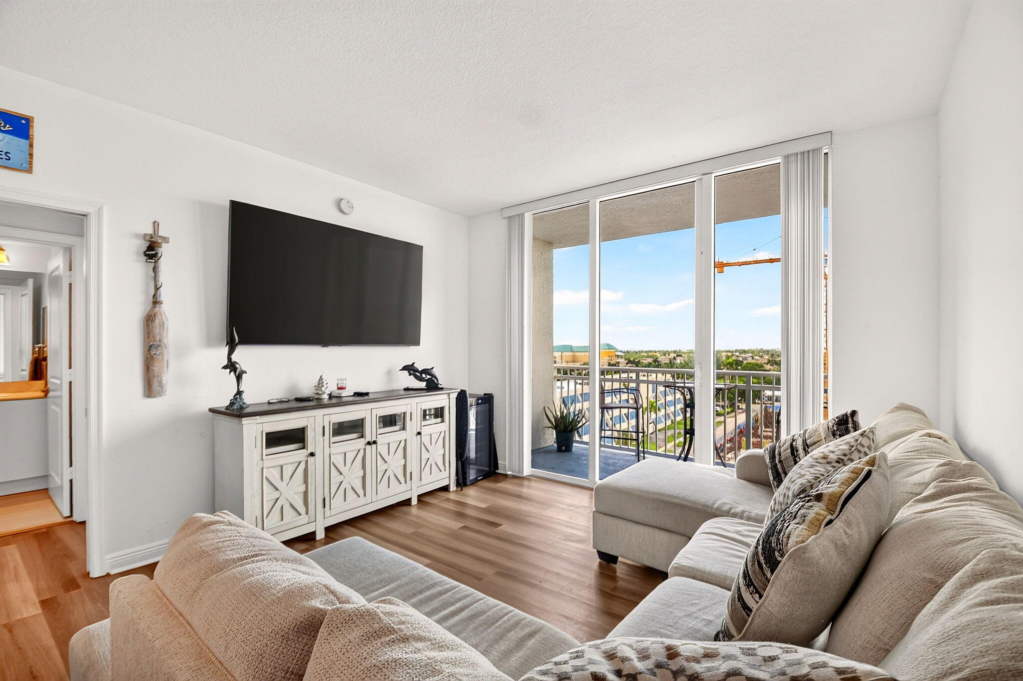Experience resort-style living in this beautifully updated 2-bedroom, 2-bathroom residence in the highly sought-after Casa Costa. Featuring a desirable split-bedroom floor plan, both spacious bedrooms offer en-suite bathrooms, providing privacy and comfort for owners and guests alike.  This move-in-ready condo has been thoughtfully updated with brand-new luxury vinyl flooring throughout, creating a fresh, modern feel. All brand-new designer furnishings are included in the sale price, making this an exceptional turnkey opportunity—simply bring your suitcase and start enjoying the South Florida lifestyle. For added convenience, the home also features an in-unit washer and dryer.   The open-concept living and dining areas flow seamlessly to a private balcony, while the well-appointed kitchen offers the perfect space for everyday living and entertaining.  Casa Costa residents enjoy exceptional resort-style amenities, including two rooftop pools with breathtaking Intracoastal views, a state-of-the-art fitness center, sauna, club room, business center, valet parking, and 24-hour concierge service. Ideally located just minutes from the beach, waterfront dining, marinas, shopping, and I-95, this prime Boynton Beach location offers the perfect balance of luxury, convenience, and coastal living.  Whether you're looking for a full-time residence, seasonal retreat, or investment opportunity, this turnkey home delivers the very best of the South Florida lifestyle.