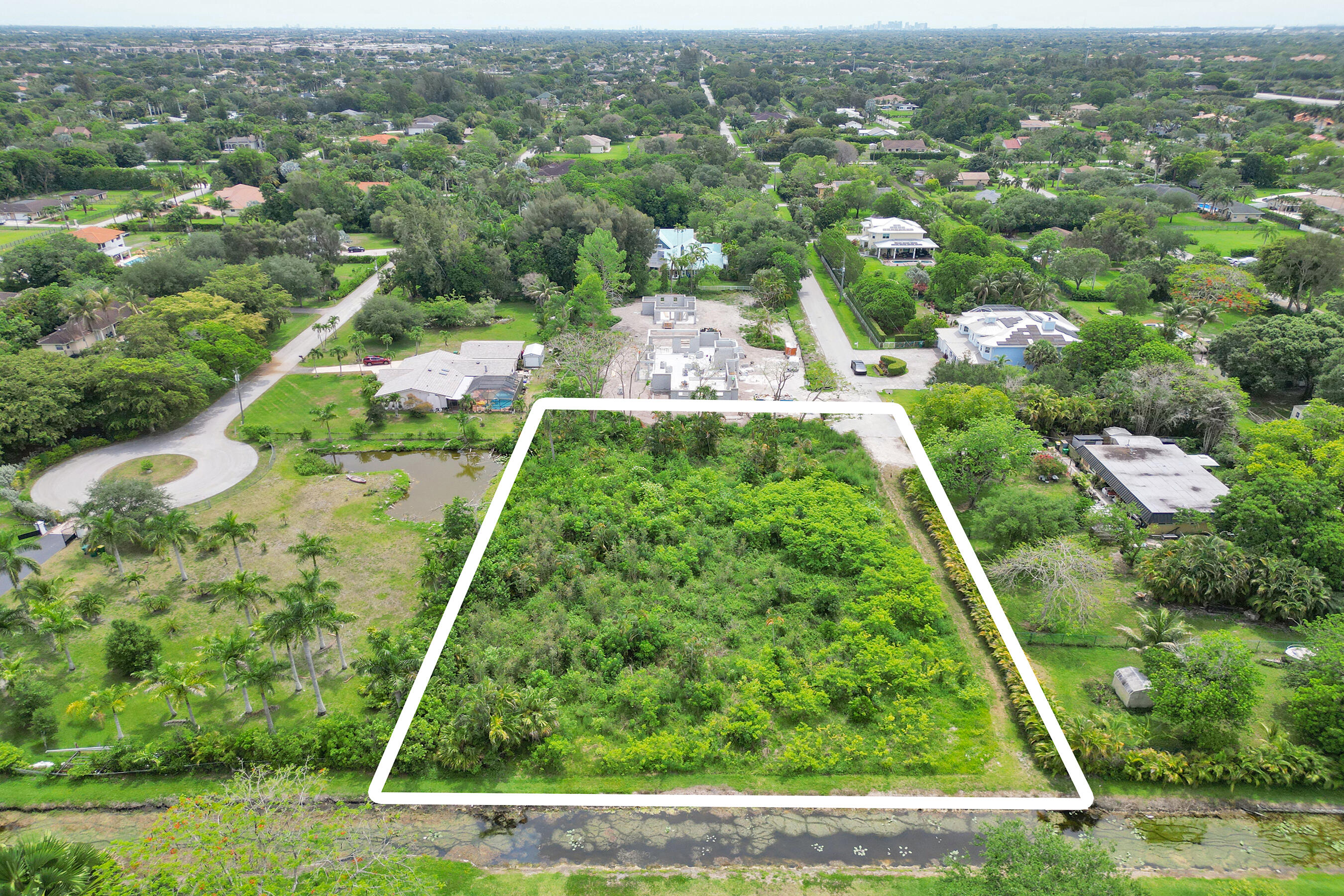 Rare opportunity to secure a premier one-acre homesite in the prestigious community of Plantation Acres. Nestled at the end of a quiet cul-de-sac, this deep acre parcel offers the ultimate canvas for a grand custom estate or a builder's next luxury project. The lot's significant depth allows for an expansive building footprint with ample room for a private backyard oasis, guest house, and more. Located in a sought-after pocket of South Florida, this property combines a serene, oversized-lot atmosphere with immediate access to the best of Broward County. With limited buildable land remaining in the area, this tranquil cul-de-sac lot is ready for your architectural vision. APPROVED CITY BLUEPRINTS FOR A SINGLE FAMILY HOUSE. CONSTRUCTION CAN BEGIN WITHIN 2 MONTHS.