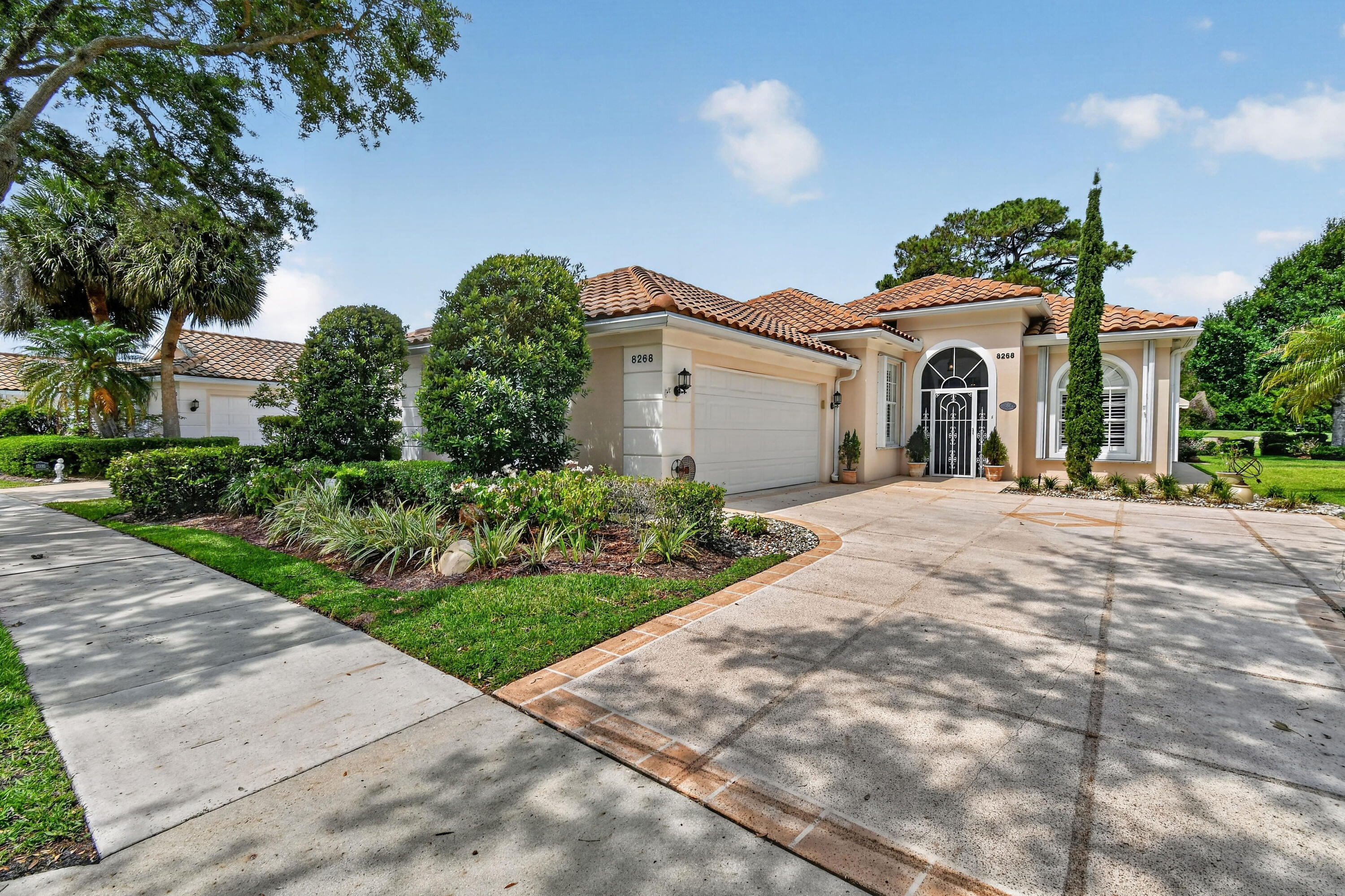 Spectacular views of the 11th fairway and lake in the desirable gated community of Lost Lake! This immaculate furnished home is being sold AS-IS with right to inspect and features numerous updates, including a 2012 concrete tile roof, 2022 hot water heater, and new A/C in 2025. The primary and guest baths offer updated countertops, while the primary bath includes a newer glass shower enclosure. Custom window valences enhance the home throughout. The office features built-in storage, French doors, and plantation shutters, creating an ideal workspace or den. Beautifully maintained and move-in ready with stunning golf and lake views!