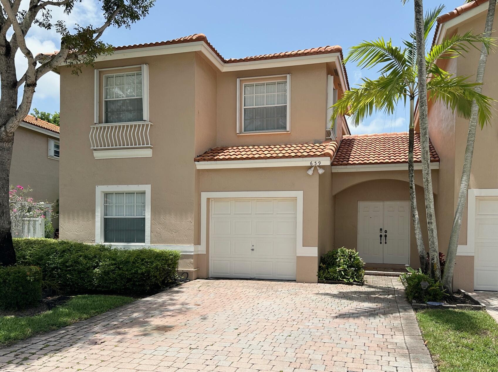 Rarely available 4-bedroom Townhome in a Gated community & Prime location! This immaculately maintained home offers spacious living & dining areas, featuring a convenient 1st-floor bedroom—perfect for guests, a home office, or multi-generational living. The Primary Suite provides a comfortable retreat, Roof replaced in 2022, Refrigerator (2024), Microwave (2024), Dishwasher (2024), Disposal (2024), full-size Washer, Dryer (2024), Range (2024), Tile flooring throughout the living areas, & Laminate flooring in the bedrooms, Screened Patio, enjoy the home's excellent location, minutes from Top-rated schools, Library, & Pembroke Gardens, a wide variety of retail & entertainment options. Easily access to I-75. Don't miss this comfortable & move-in-ready home.  Call today!