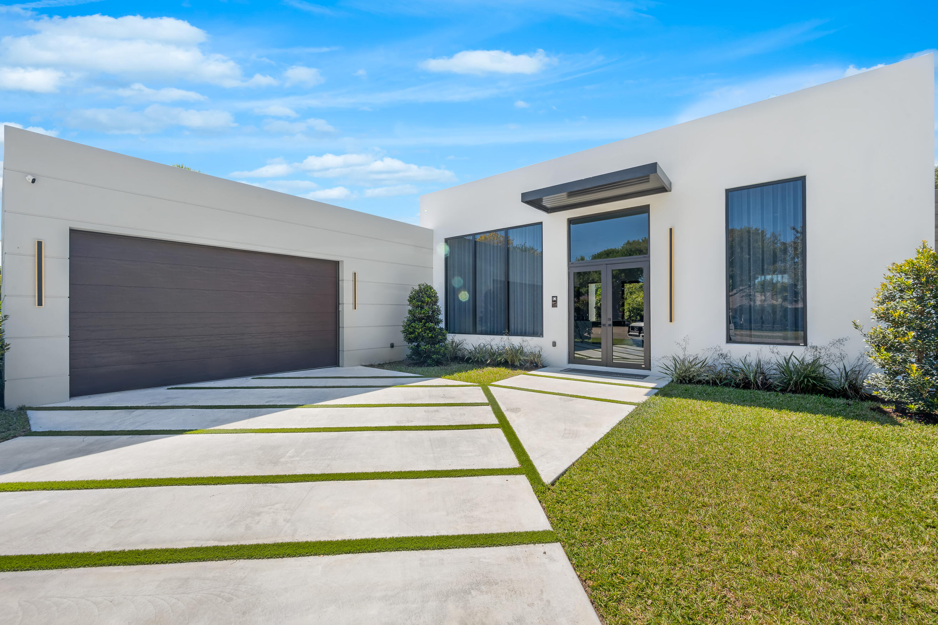 New contemporary estate featuring over 4,500 sf. indoor and outdoor living spaces tied together by the use of glass, water and light in a blend of space and sophistication. This one-story luxurious property includes 4 bedrooms and 4.5 bathrooms offering lots of ample space, soaring high ceilings, European Kitchen equipped with Thermador appliances, Italian solid 8 ft. doors, custom designed pool, all build with highest level of quality, detail and craftmanship. Located near top schools, organic markets, and restaurants, with easy highway access near major highways, this property combines elegance, convenience, and ultimate comfort.