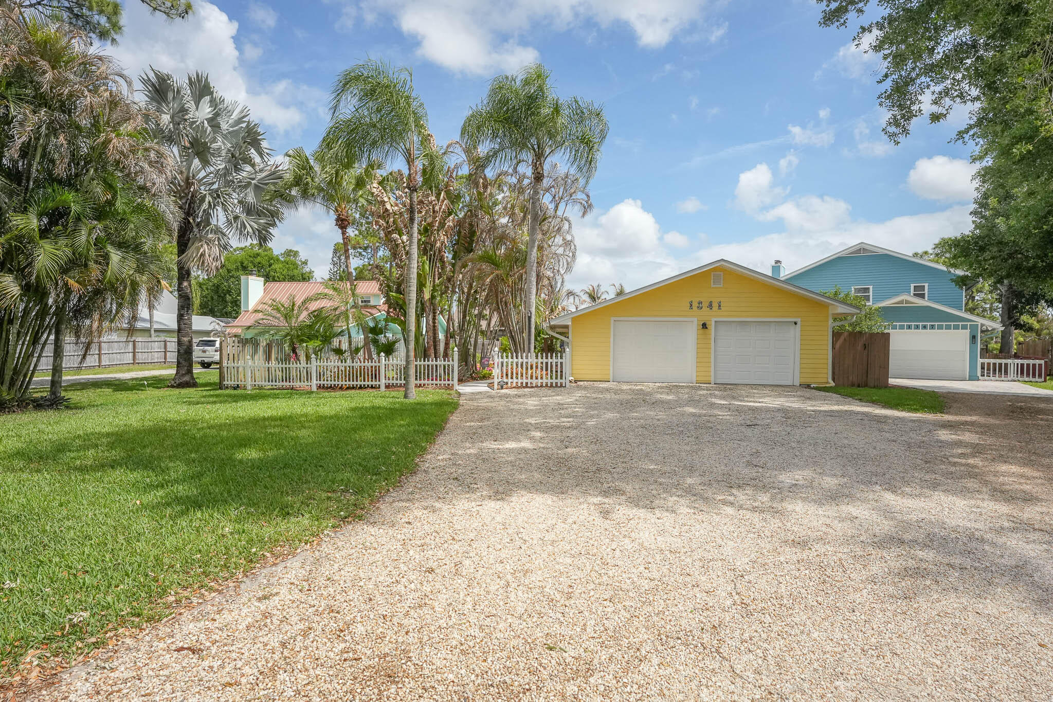 Waterfront home with ocean access in Palm City's Rustic Hills — a unique neighborhood entered through one of only ~30 wooden covered bridges in Florida. Fully renovated 3BR/2.5BA plus in-law suite with kitchenette and full bath, 2,300 SF on a cul-de-sac. Pull up to your  62' private dock on a ocean access canal, minutes to the St. Lucie River, inlet, and Atlantic. Open floor plan, designer island kitchen, beamed ceilings, slate countertops. New roof (2020), AC handler (2021), hot water heater (2024), EV charging, reverse osmosis system, and SimpliSafe security. A-rated Martin County schools with top-ranked Bessey Creek Elementary. Minutes to downtown Stuart — the Sailfish Capital of the World — beaches, I-95, and FL Turnpike. WELCOME TO RUSTIC HILLS — PALM CITY'S HIDDEN GEM  Tucked away in one of Palm City's most unique waterfront neighborhoods, 1341 SW Evergreen Lane offers the rare combination of a fully renovated home, ocean water access, and a lifestyle that feels like a permanent vacation.  THE HOME This beautifully remodeled 3-bedroom, 2.5-bathroom residence with a separate mother-in-law suite (kitchenette and full bath) delivers 2,300 square feet of thoughtfully designed living space. The open floor plan showcases a designer island kitchen appointed with gorgeous slate countertops, stainless steel appliances, and beamed ceilings in the living room. New floors, doors, and fixtures were installed throughout during the complete renovation. The spacious primary suite features a walk-in closet and stunning en suite bath. Generous guest bedrooms share another beautifully finished bath. The mother-in-law suite provides flexible space — ideal for extended family, guests, or a home office.  WATERFRONT LIVING & OCEAN ACCESS Step outside to multi-level decks leading to your 62-foot private dock on a ocean-access canal. From your backyard, it is a short cruise to the wide St. Lucie River, Stuart Sandbar, downtown Stuart's waterfront dining, and onward through the St. Lucie Inlet to the Atlantic Ocean. Watch manatees glide through the canal and fish jump from your deck. Whether you enjoy fishing, boating, paddle boarding, or water sports, this location puts you in the heart of it all.  MAJOR UPGRADES & IMPROVEMENTS The home has been meticulously maintained and upgraded since the 2020 renovation: - New Roof (2020) - New AC Air Handler (2021) - New Hot Water Heater (2024) - SimpliSafe Alarm System - Reverse Osmosis Water Filtration for Drinking Water - EV Charging Outlet in Garage - Additional Insulation Over Garage - Professional Tropical Landscaping - New Irrigation System - Large driveway accommodating multiple vehicles THE NEIGHBORHOOD — RUSTIC HILLS Rustic Hills is a waterfront enclave of 178 homes originally developed in the early 1970s as a fishing camp, now evolved into a tight-knit community with a distinctly Key West character. The neighborhood's signature feature is its wooden covered bridge entrance — one of approximately 30 registered wooden covered bridges in all of Florida. Winding one-lane roads, lush tropical landscaping, and a relaxed pace give Rustic Hills a charm all its own. The community is golf cart friendly and known for its vibrant social scene including regular potluck dinners, holiday gatherings, and what neighbors call the best Halloween party around. HOA dues are approximately $25 per month.  LOCATION Situated in the heart of Palm City in Martin County, Florida, this home is ideally positioned: - Minutes to downtown Stuart — officially designated  as the Sailfish Capital of the World - Close to Martin County's beautiful beaches and waterways - A-rated Martin County School District with top-ranked Bessey Creek Elementary (rated 9/10 by GreatSchools, #1 in Martin County by Niche) - Minutes to Publix, gyms, restaurants, and everyday conveniences - Quick access to I-95 and the Florida Turnpike - Stuart and Martin County sit on one of the most biodiverse estuaries in the Northern Hemisphere with world-class fishing, boating, sailing, and water sports Martin County is a boater's paradise offering access to the St. Lucie River, Indian River Lagoon, Intracoastal Waterway, and the Atlantic Ocean — all from your backyard dock.