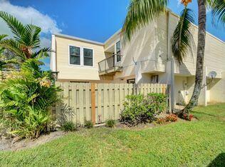 Beautiful 2-bedroom, 2.5-bath home ideally located directly across from the Recreation Center & Aquatic Complex, and just minutes from The Mall at Wellington Green, shopping, dining, and top-rated A schools. Features a modern kitchen with granite countertops and stainless steel appliances, tile flooring throughout the living areas, and carpet in both bedrooms. Enjoy abundant storage with spacious walk-in closets, plus a private fenced courtyard perfect for relaxing or entertaining. A wonderful opportunity to enjoy comfort, convenience, and community living!