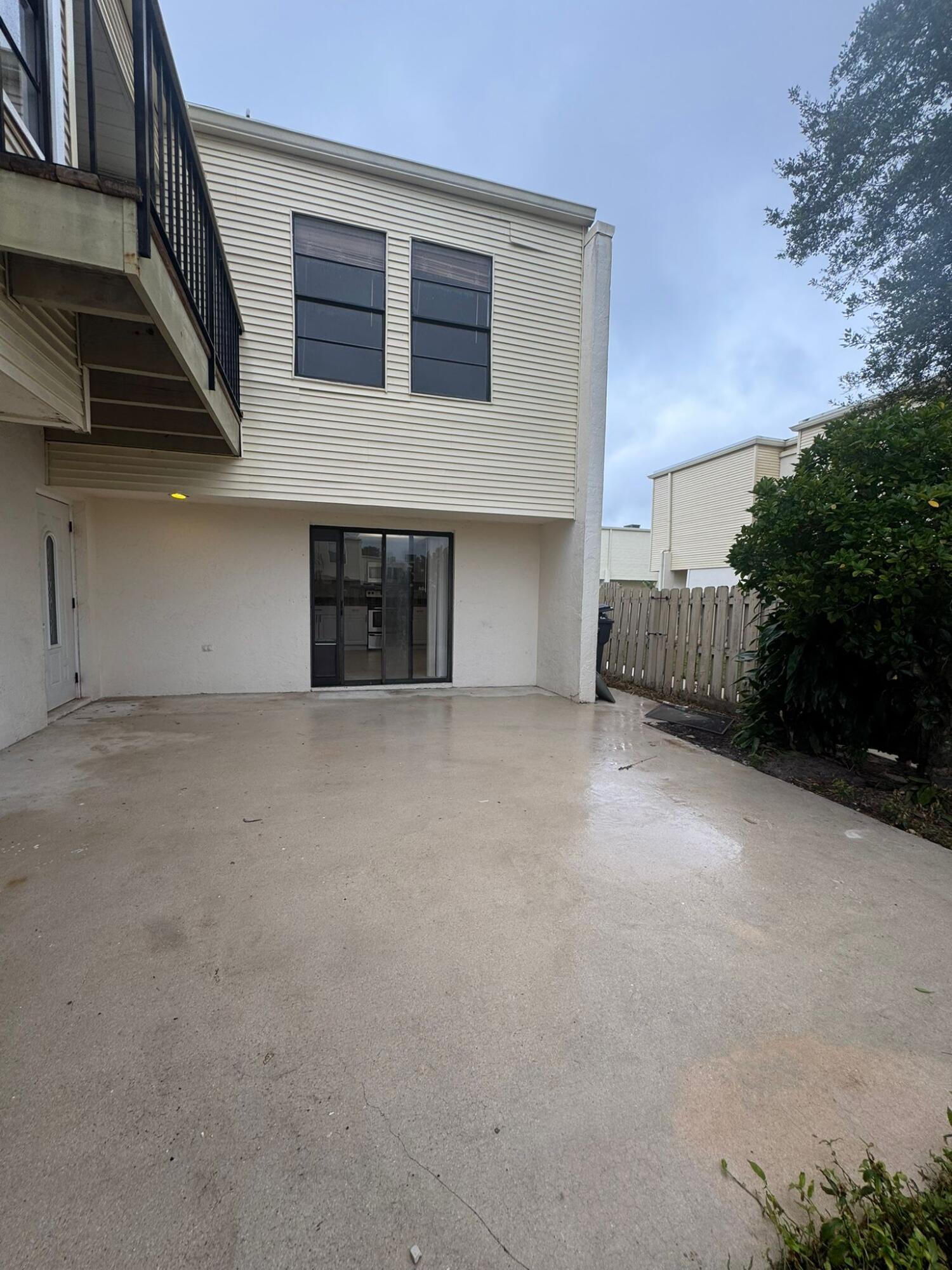 Beautiful 2-bedroom, 2.5-bath home ideally located directly across from the Recreation Center & Aquatic Complex, and just minutes from The Mall at Wellington Green, shopping, dining, and top-rated A schools. Features a modern kitchen with granite countertops and stainless steel appliances, tile flooring throughout the living areas, and carpet in both bedrooms. Enjoy abundant storage with spacious walk-in closets, plus a private fenced courtyard perfect for relaxing or entertaining. A wonderful opportunity to enjoy comfort, convenience, and community living!