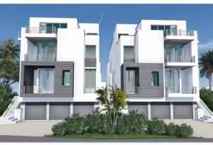 New modern building on the beach by Randall Stofft Architecture and Marc-Michael's Interior Inc. Estimated finishing time March 2015, still time for buyer to add finishing touch.