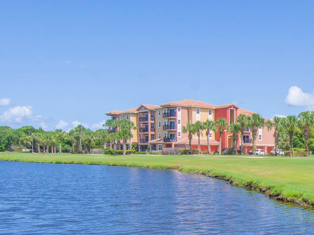 Welcome to Linkside at Gator Trace. This end unit offers sweeping views of the 3rd hole of Gator Trace golf course with pond and preserve views beyond. With a Spacious living area, tile throughout the unit and a recently replaced a/c unit, this condo is move in ready.  offering 1,269 square feet of finished living space, three-bedroom, two-bathroom unit with plantation shutters throughout. Condo comes with a single car garage for convenient parking and storage. This condo presents an excellent opportunity for those seeking an affordable golf course condo!