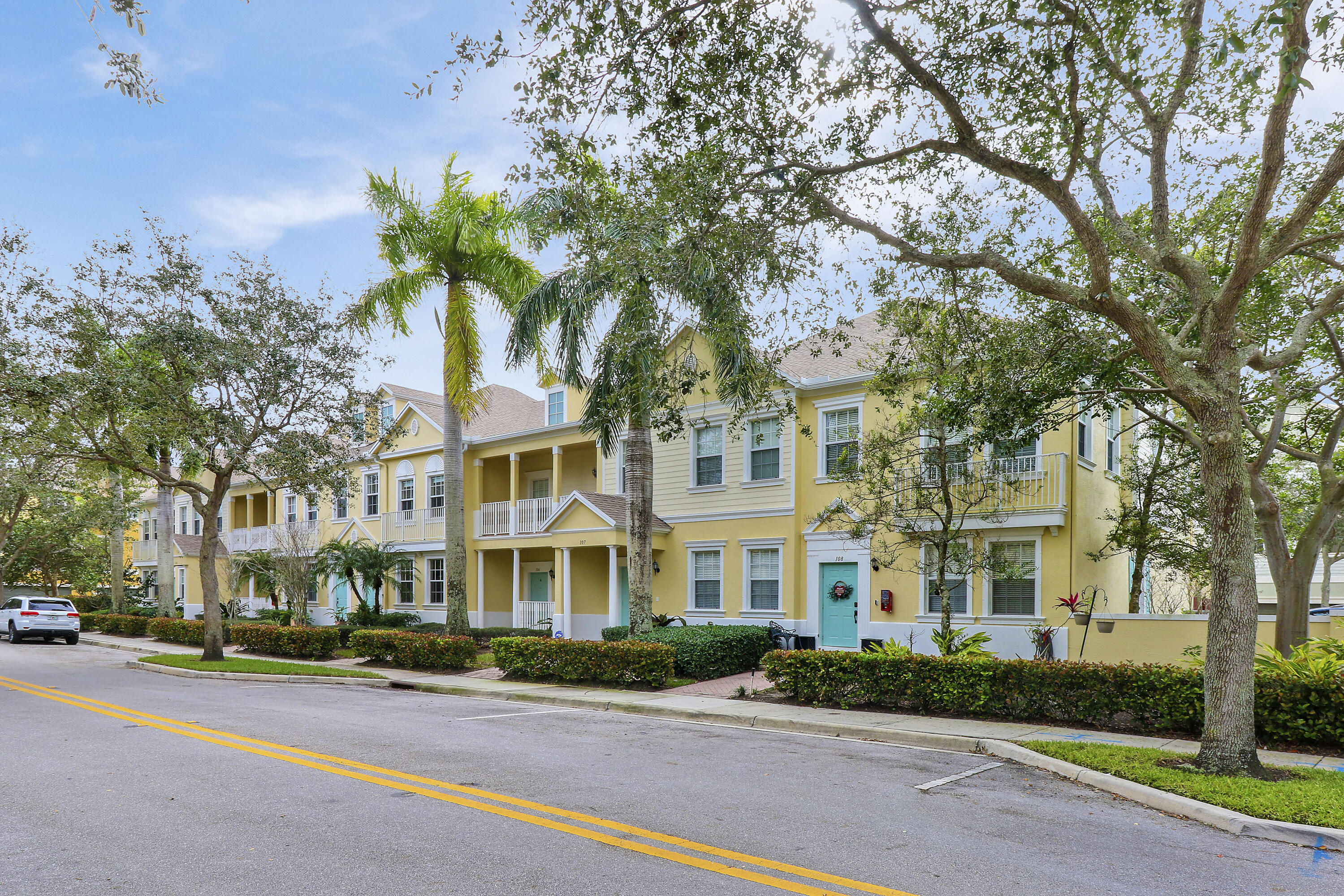 Welcome home to 118 Seagrape Dr 105! This beautiful two-story, 3-bedrooms, 2.5-bathrooms, plus 1-car garage townhome is nestled in the serene and convenient community of Sandpiper Cove at Botanica! Upon entering, notice the open living space with gorgeous 30x30 porcelain tile flooring complemented by new oversized baseboards and neutral paint colors. New crown molding gracefully frames the first floor, adding a touch of sophistication to the living areas. Adjoined to the living-dining space is a newly updated powder room. Step into the quaint kitchen featuring granite countertops and stainless steel appliances, creating a perfect blend of functionality and style. A delightful breakfast area, perfect for a kitchen dinette, overlooks the tranquil courtyard patio, offering an inviting private space for morning coffee or intimate meals and gatherings. The second-story master suite offers a spacious bedroom with crown molding, a large walk-in closet with built-in shelving, and a second closet. The ensuite bathroom boasts dual sinks, a large soaking tub, and a separate walk-in shower. The second floor unfolds with a split floor plan, featuring a loft space adorned with wood-look plank flooring, two additional bedrooms, and an updated second bathroom with new toilet and tub. Recent enhancements include new carpeting in the bedrooms and crown molding throughout. Practical updates enhance the functionality of this home, including a new full-size washer and dryer (2023), new hot water heater (2023), and a newer AC (2020). Enjoy the tranquility of the outdoors in your spacious courtyard patio, with convenient access to the 1-car garage and an additional parking space.  Botanica offers residents a beautiful community pool and the best of both serenity and convenience with charming walking paths and ponds and is located a short walk to Publix Supermarket, Starbucks shops, and dining, located just minutes from Abacoa's Roger Dean stadium and downtown Abacoa's prime shopping and dining, where you can enjoy concerts, art festivals, and a number of events. Schedule your private showing today!  Jupiter needs no introduction - renowned for its stunning beaches, excellent schools, beautiful shopping centers, and diverse dining options, it offers the perfect blend of coastal charm and modern convenience. Easy access to major highways allows a straightforward commute to PBI airport Florida Turnpike. This one is a must-see!